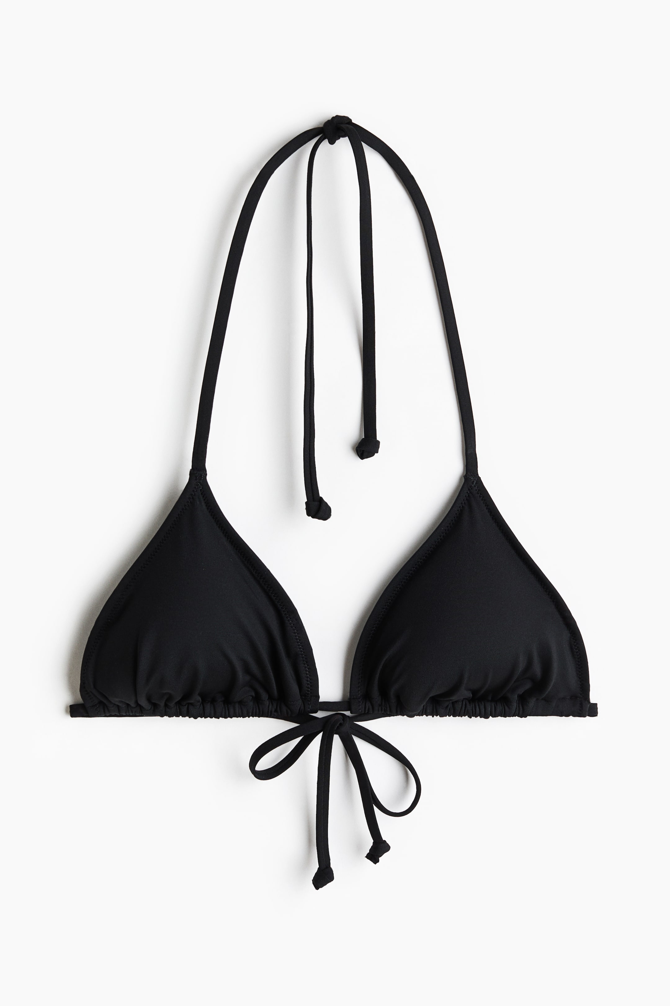 View larger image: A black triangle bikini top is shown from the front, highlighting triangular cups with ruching at their base, and thin straps forming ties at the back and neck.