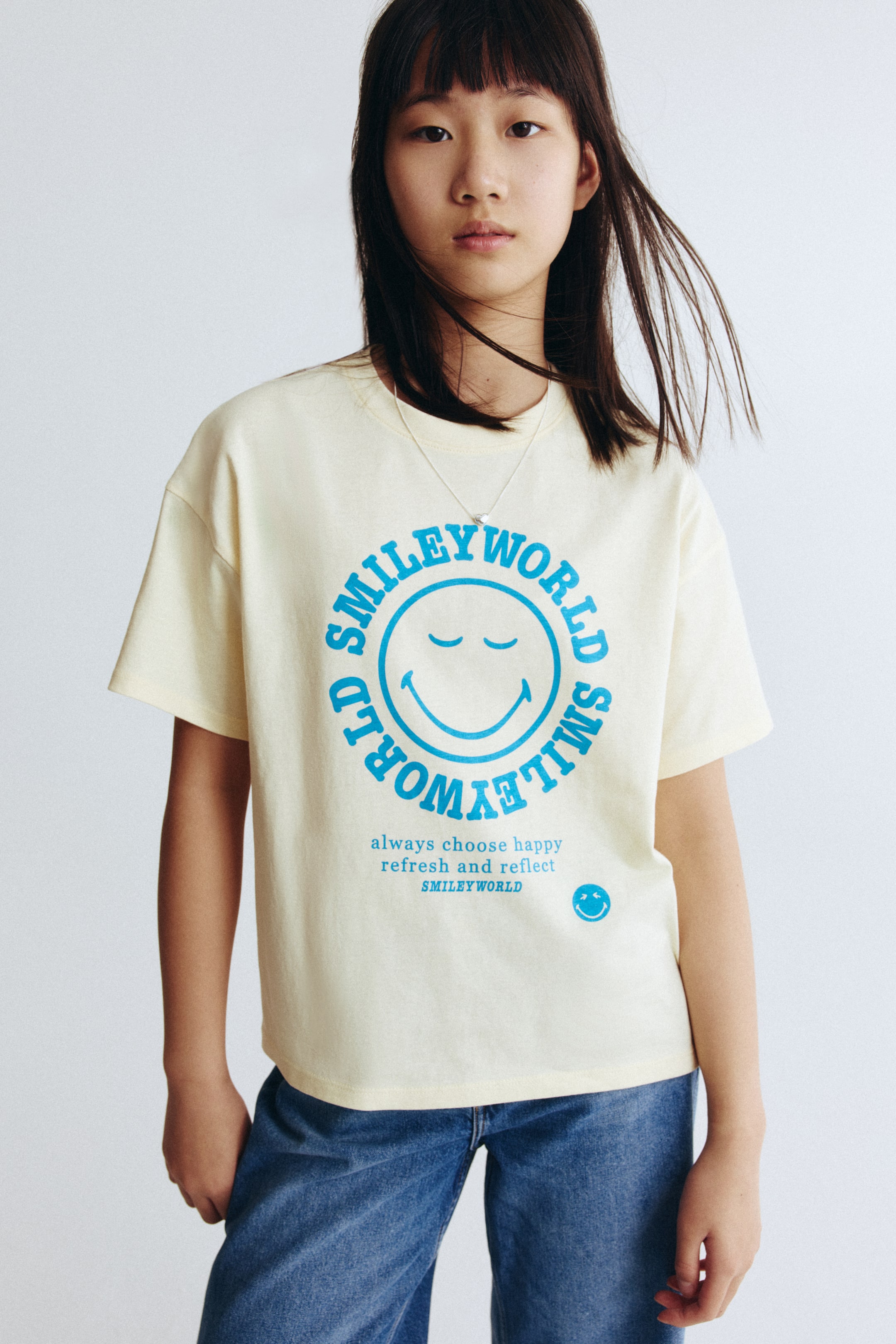 Visa större bild: T-shirt i bomull med tryck - Ljusgul/SmileyWorld® - BARN | H&M FI 1