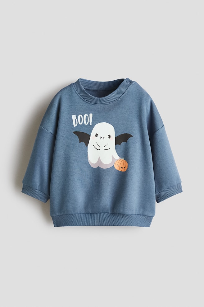 Sweatshirt mit Print - Helles Mattblau/Boo!/Hellgrün/Dinosaurier/Hellbeige/Paris/Marineblau/Little Bro/Marineblau/Weltall/Dunkelbraun/Teddybär/Dunkelrot/NYC/Weiß/Autos/Cremefarben/Autos/Grün/Weiß/Hellblau/Wale/Hellbeige/Hunde - 1