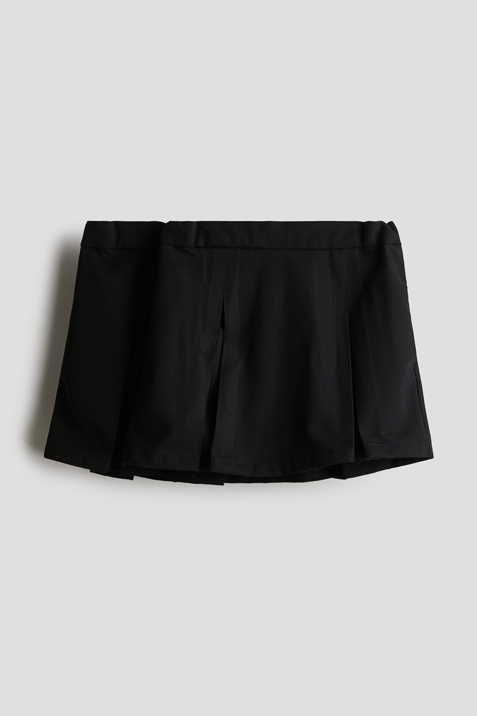 Детские юбки H&M 2-pack Pleated Skirts, цвет: Чёрный — фото 1