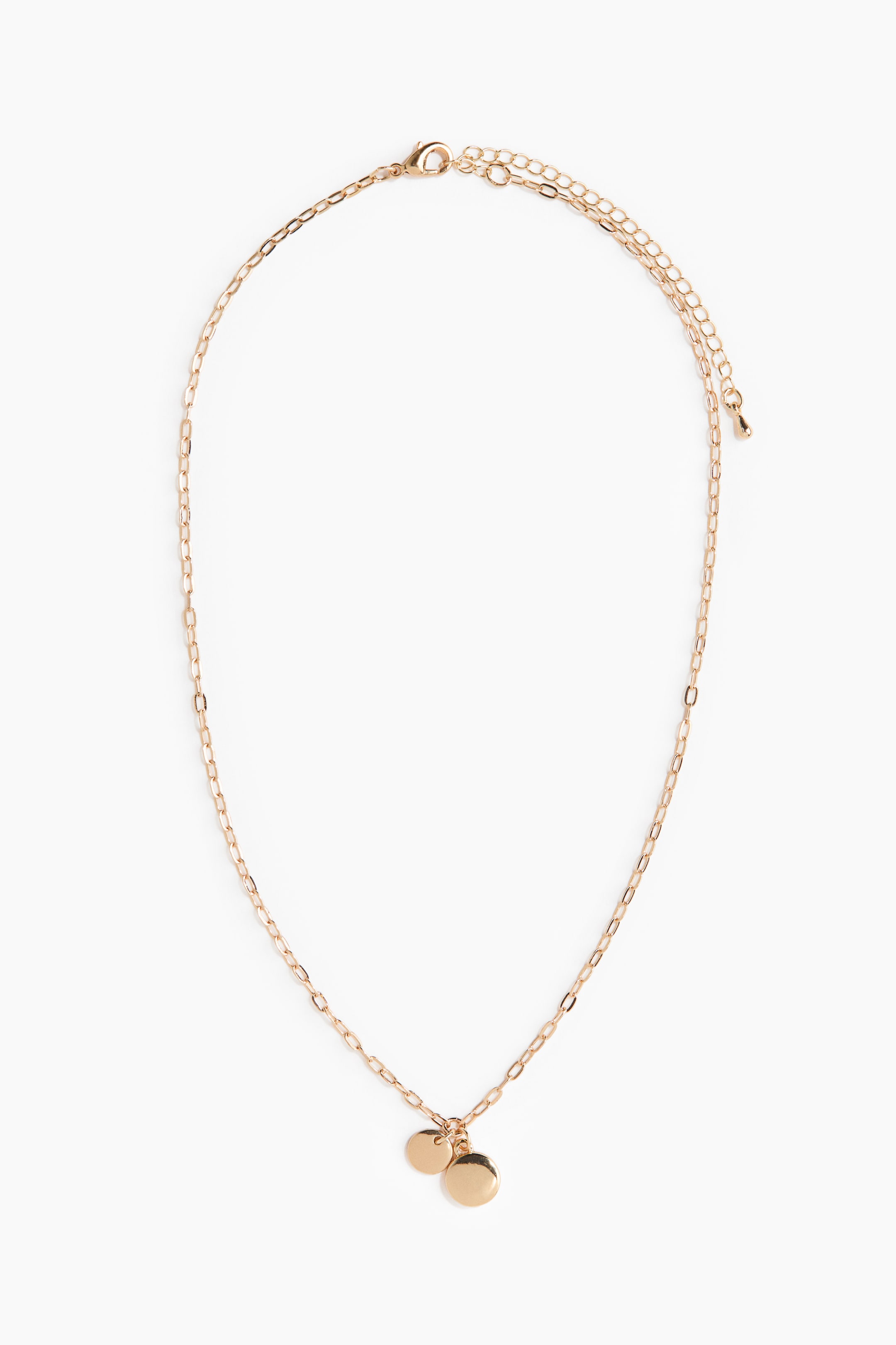 View larger image: A gold-toned necklace features an elongated link chain, adorned with two flat, round disc charms of varying sizes hanging at the bottom centre. A lobster clasp and an extender chain are visible at the top.