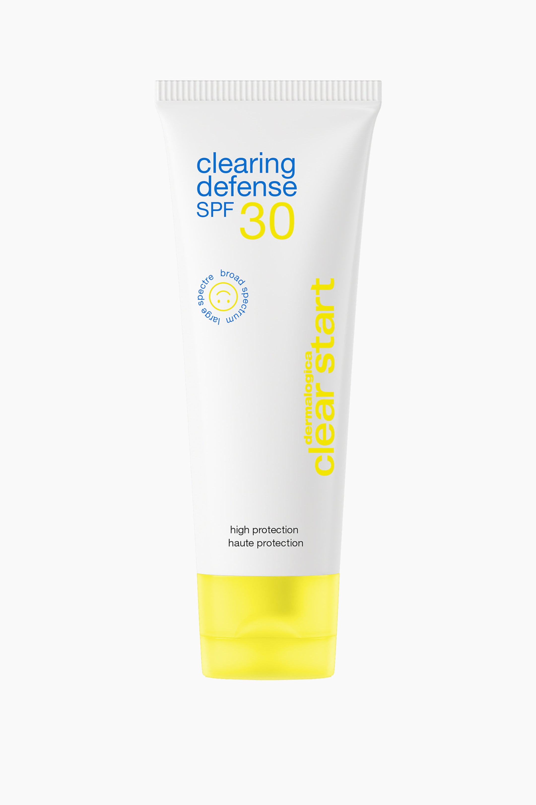 Visa större bild: En vit klämburk med Dermalogica Clear Start Clearing Defense SPF 30-fuktkräm står upprätt och vänd framåt. Tuben har blå och gul text med en cirkulär sol-logotyp på framsidan och avslutas med ett klargult flip-top-lock längst ned.