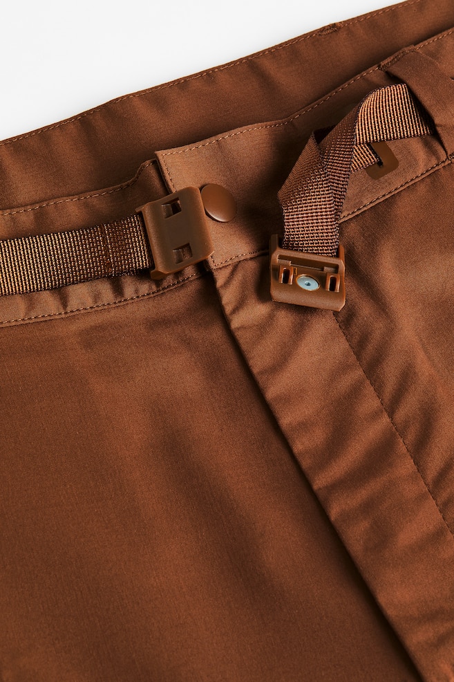 Water-repellent zip-off hiking trousers - Brown/Black - 9