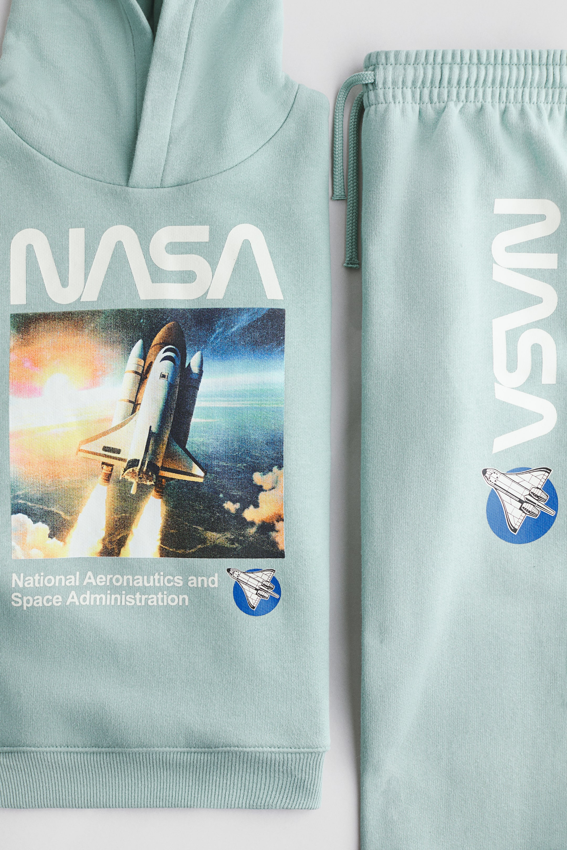 View larger image: 2-piece printed sweatshirt set - Light turquoise/NASA - Kids | H&M IN 2