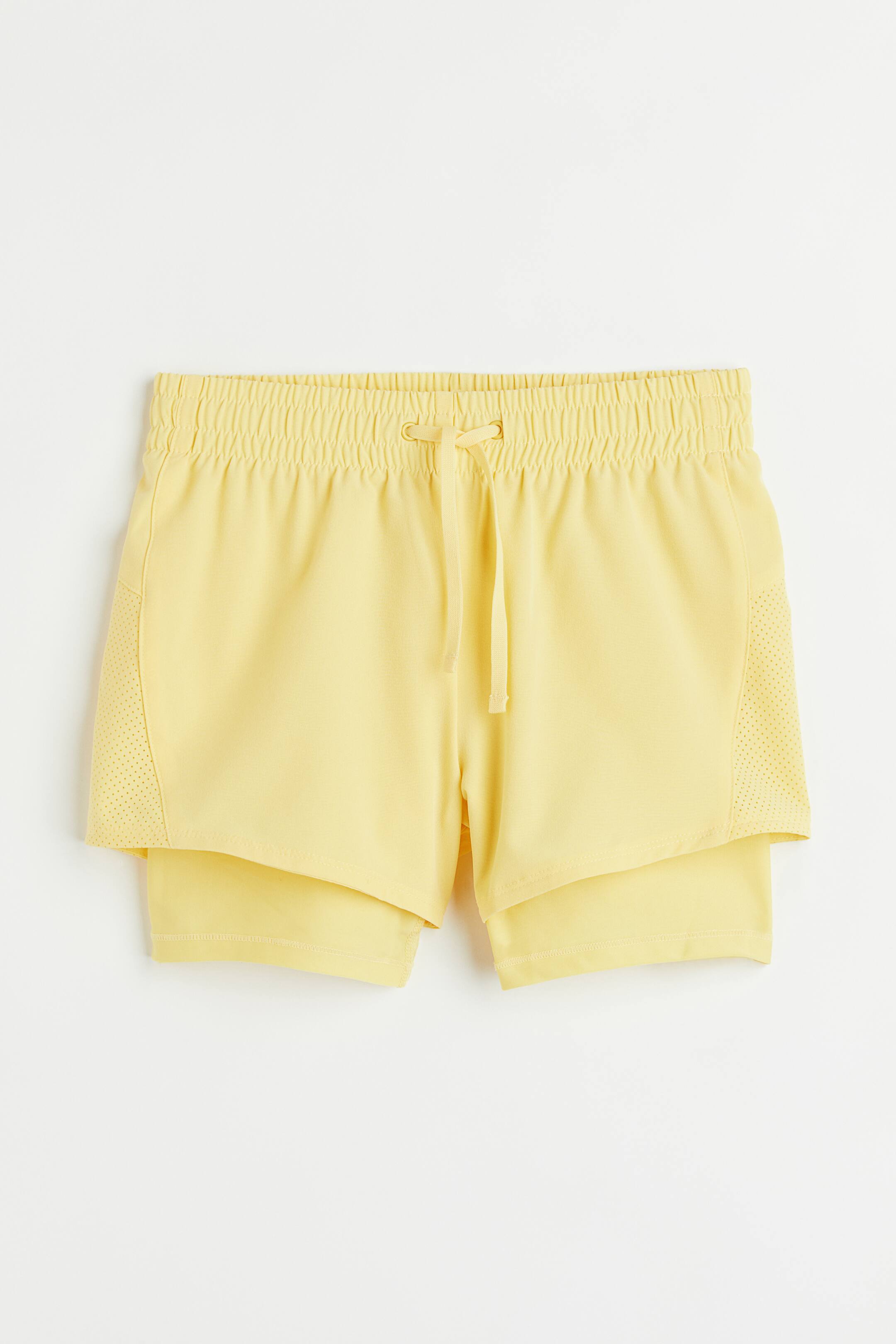 View larger image: Double-layered sports shorts in DryMove™ - Light yellow - Kids | H&M 1