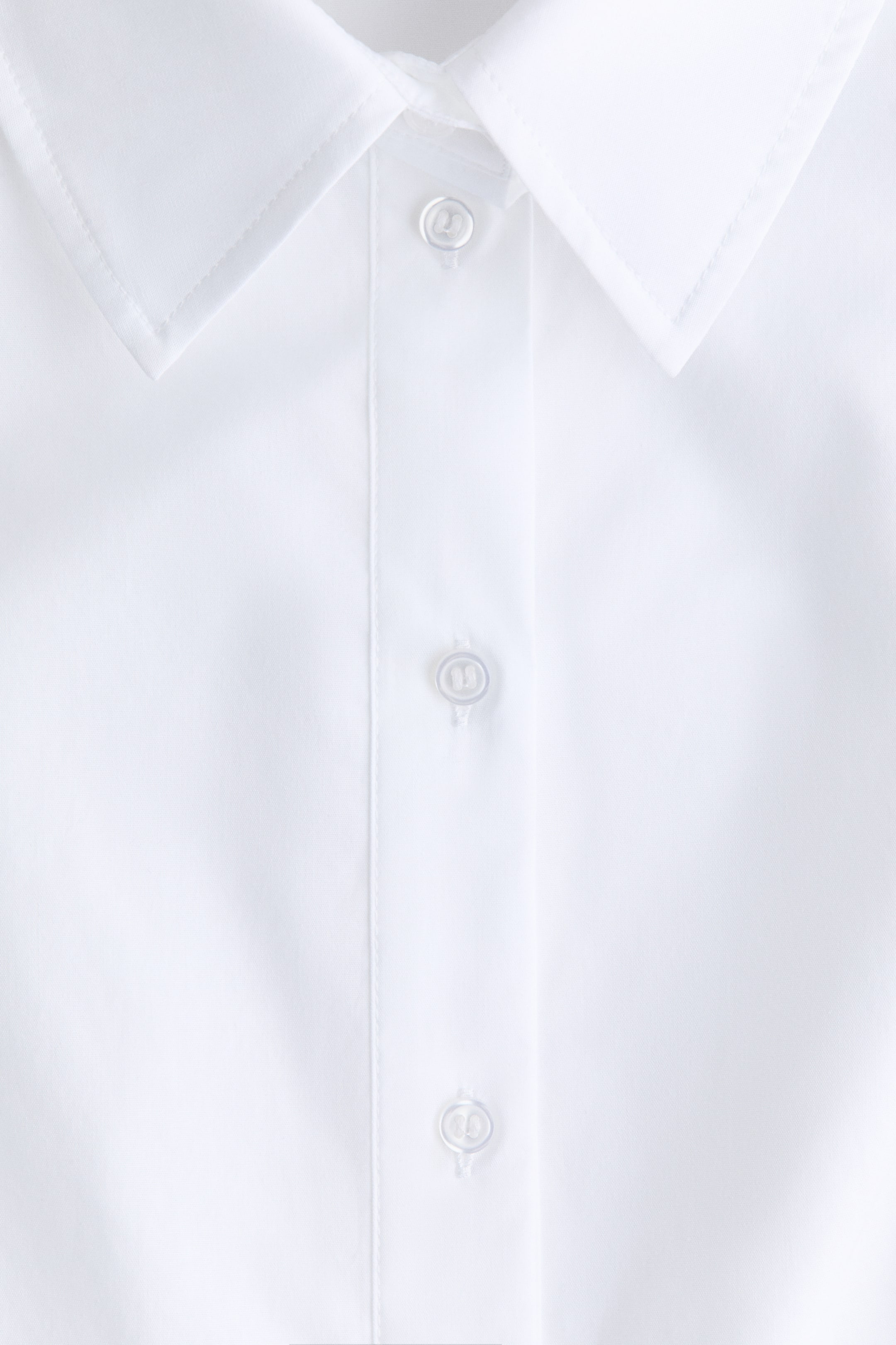 Chemise péplum en popeline