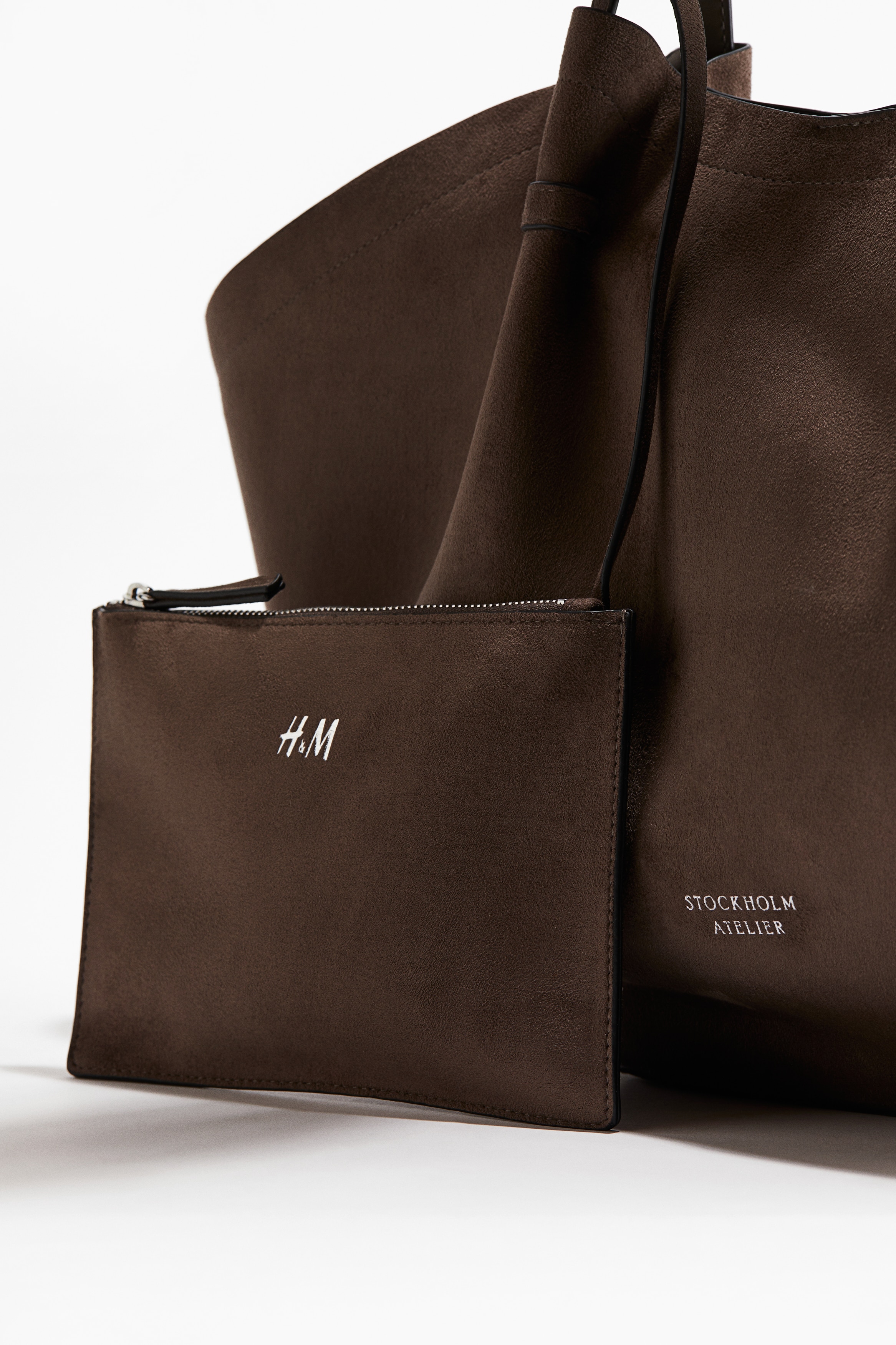 Shopper with pouch