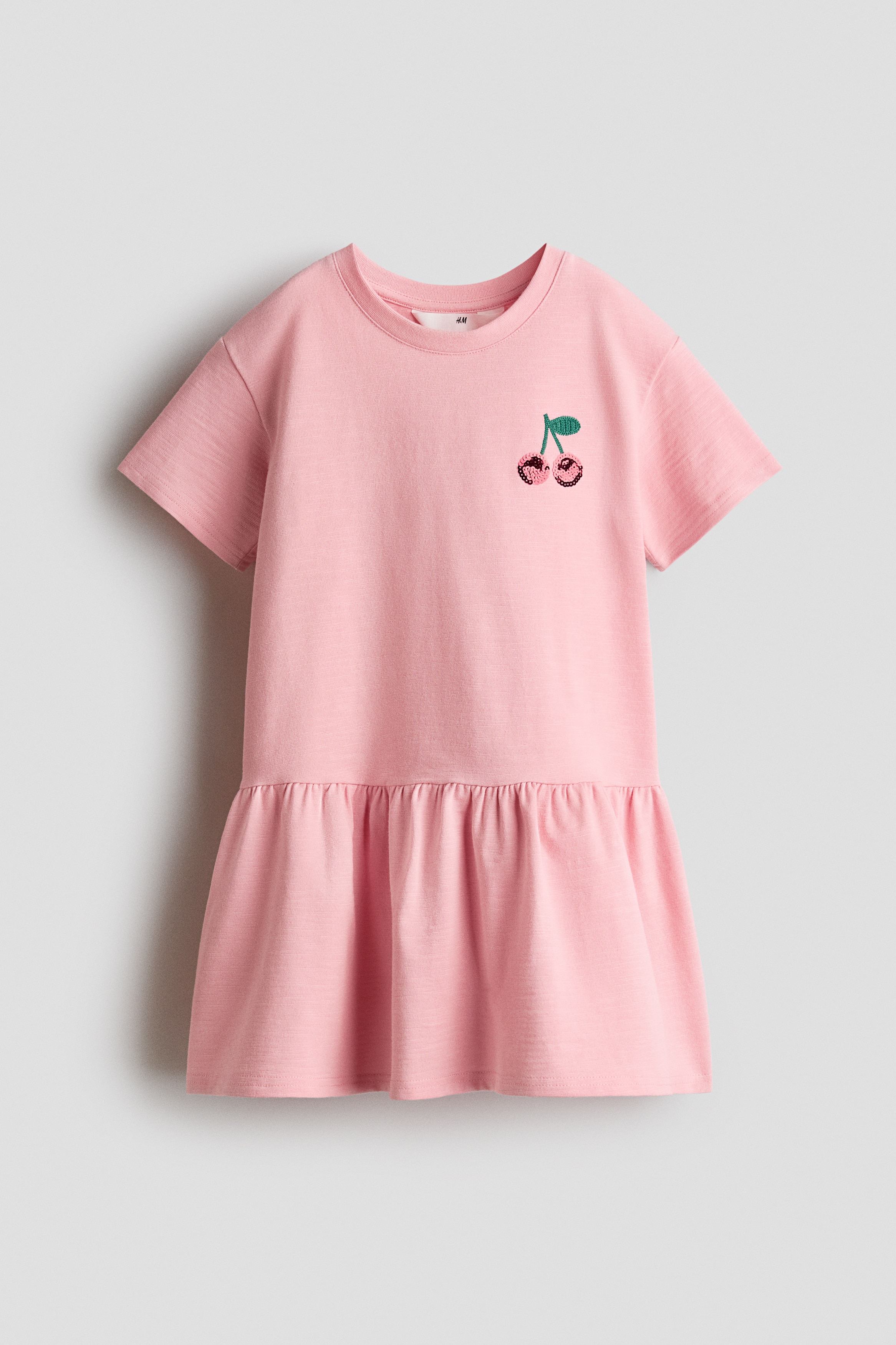 T-Shirtkleid mit MotivModell