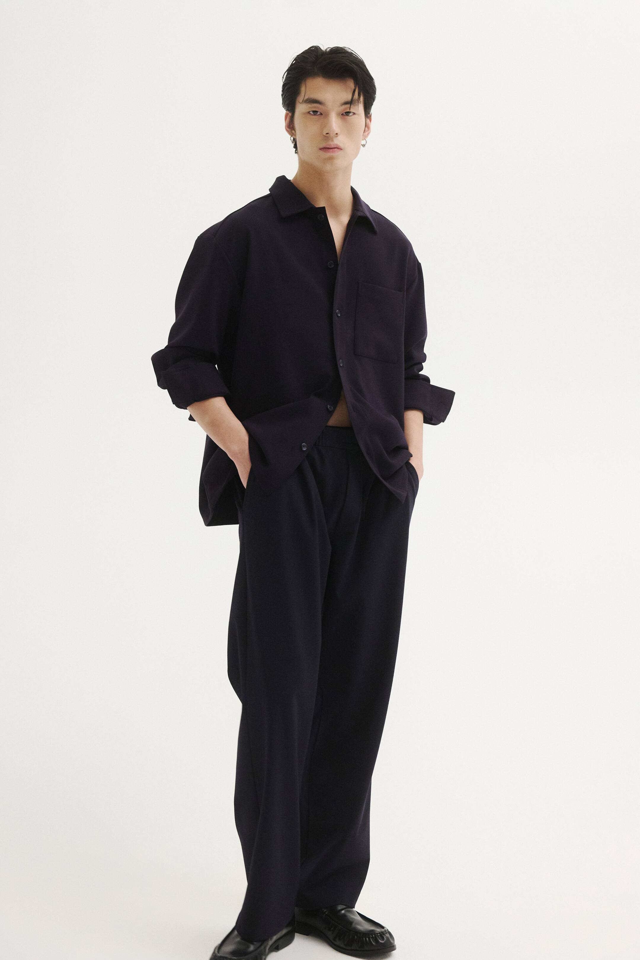 View larger image: Four-way Stretch Wide Pull-on trousers - Navy blue - Men | H&M SG 1