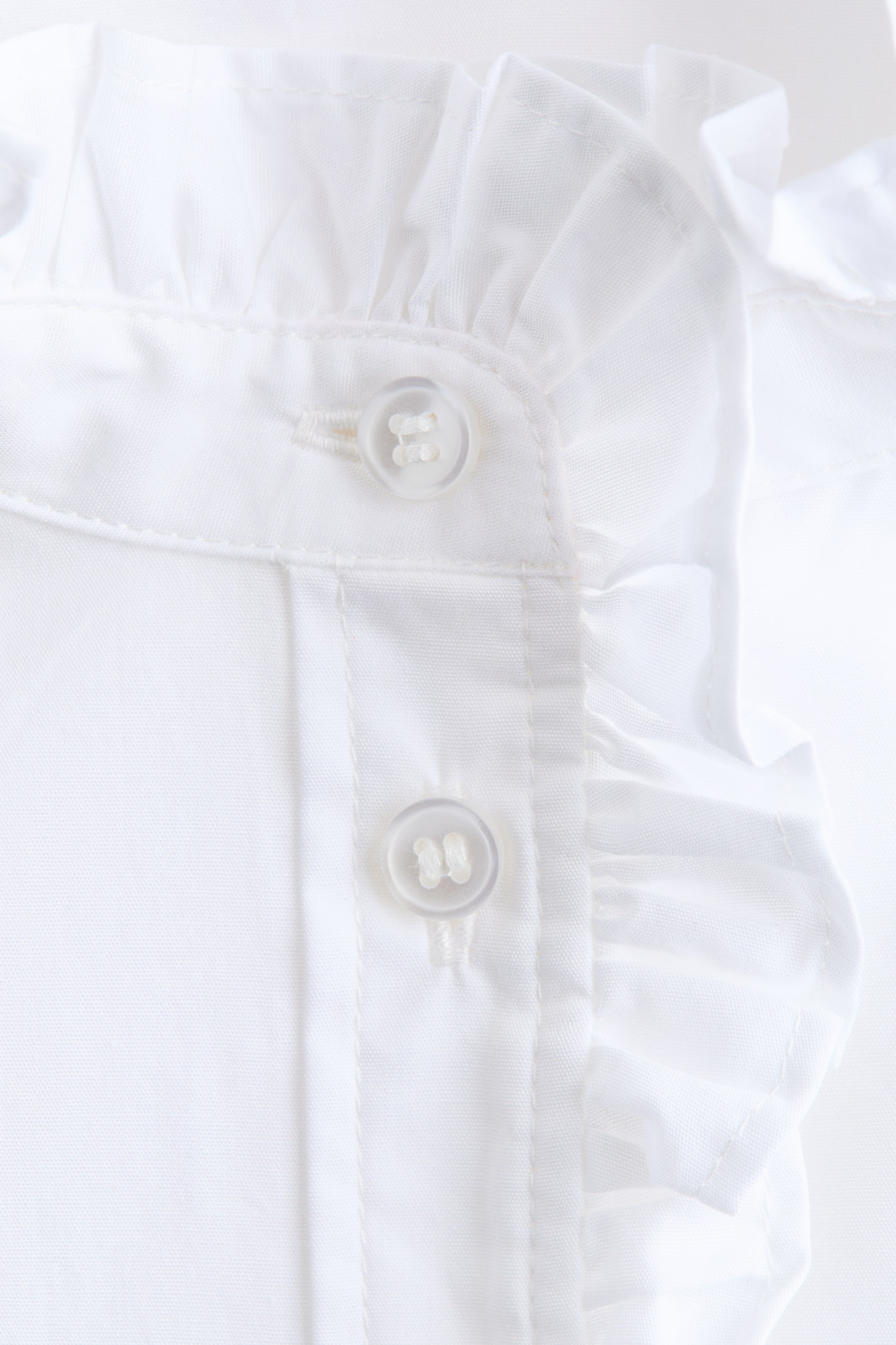 Blouse volantée à boutons