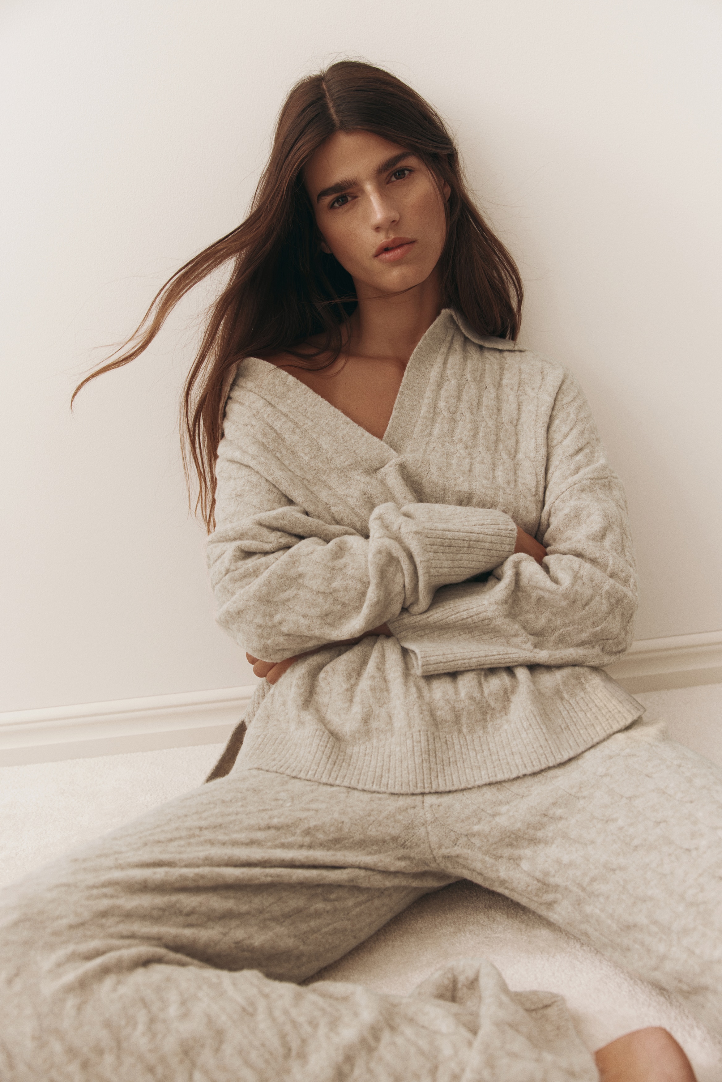 Cable-knit polo jumper