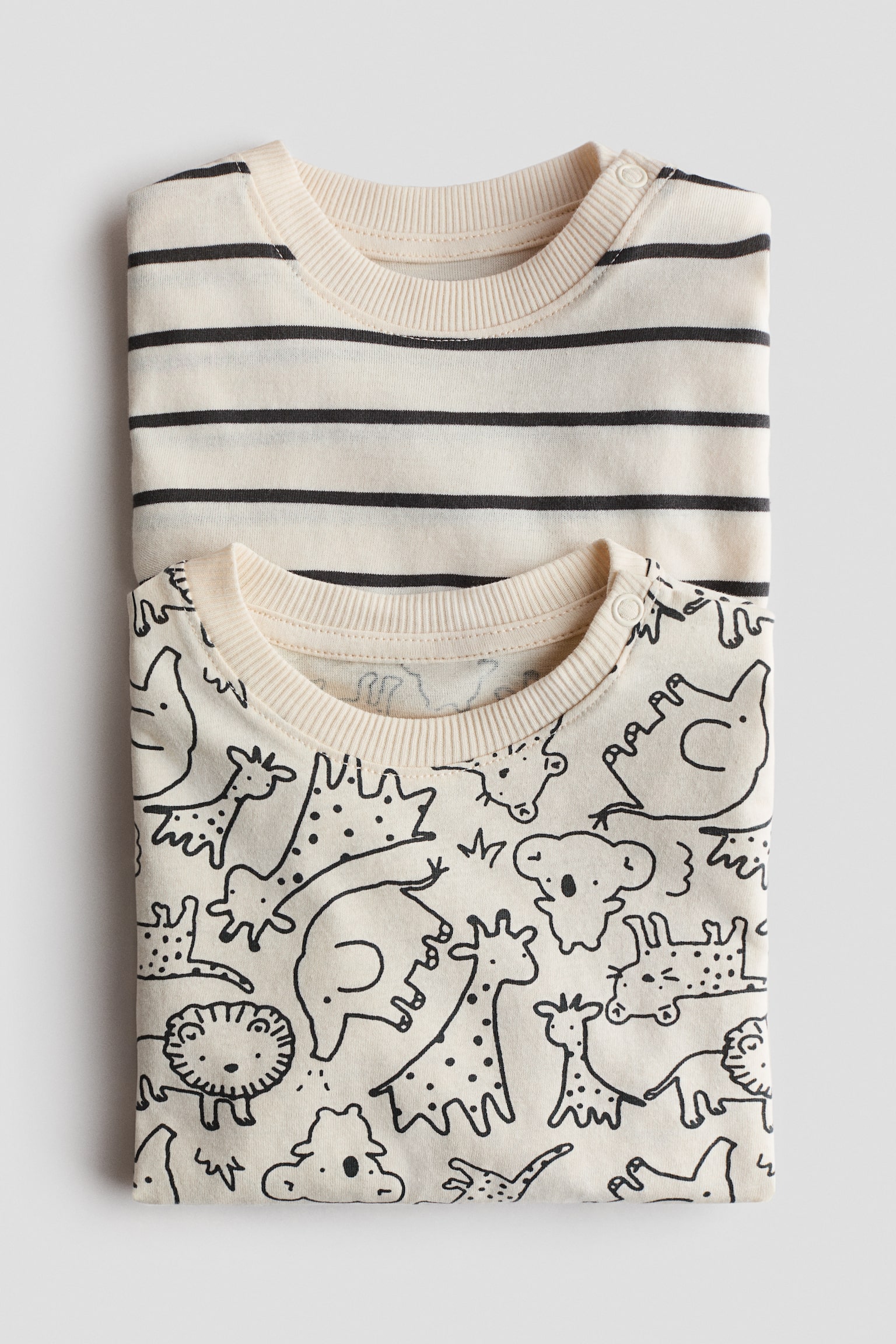 2-pack printed T-shirts - Light beige/Animals/Blue/Dinosaurs - 2