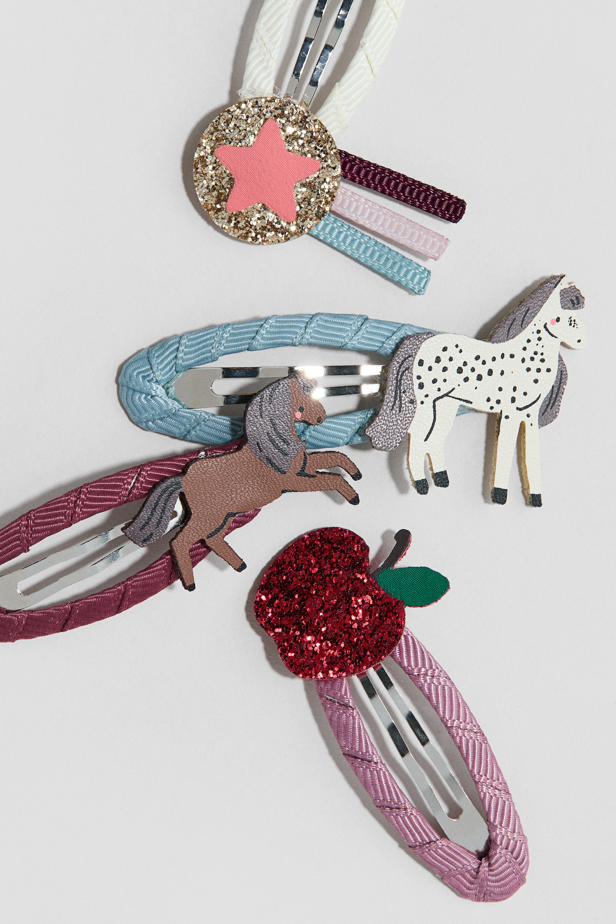 Lot de 4 barrettes avec appliqué