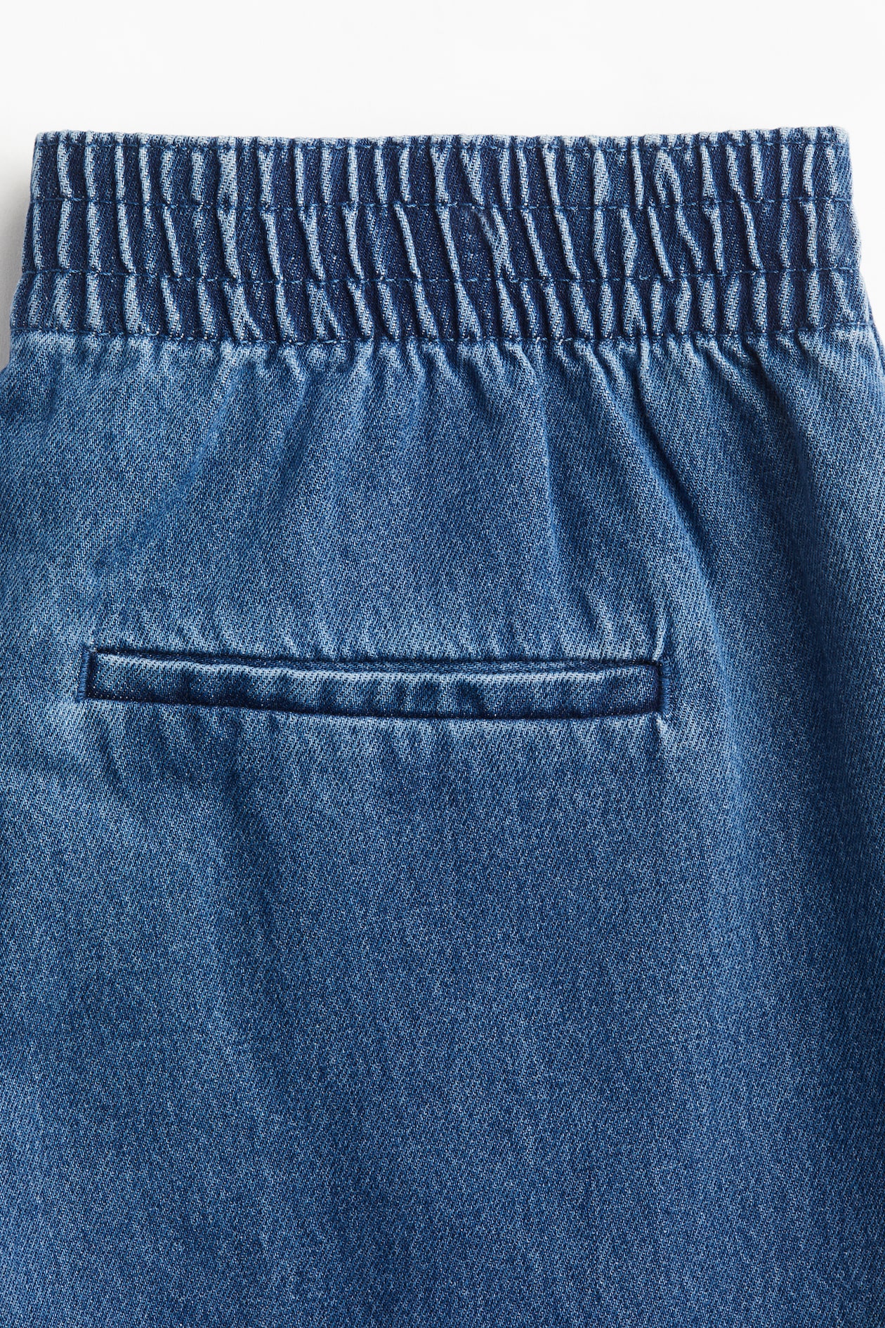 Pull-on denim trousers - image 4