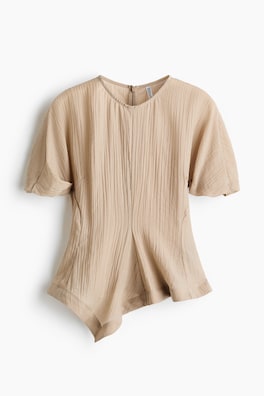 Blus i lyocellmix med flikig nederkant