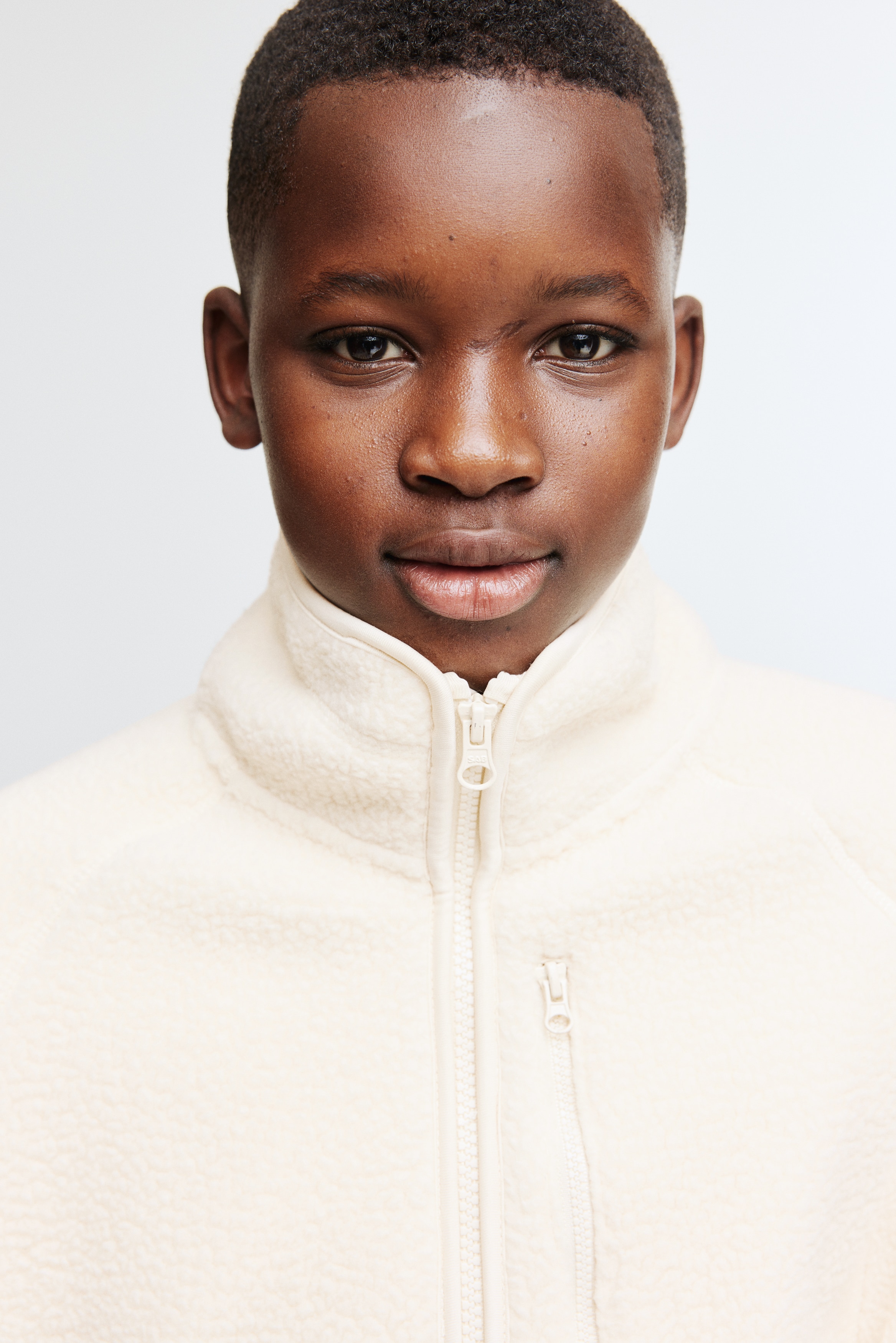 Jakke i teddy - Lys beige/Sort