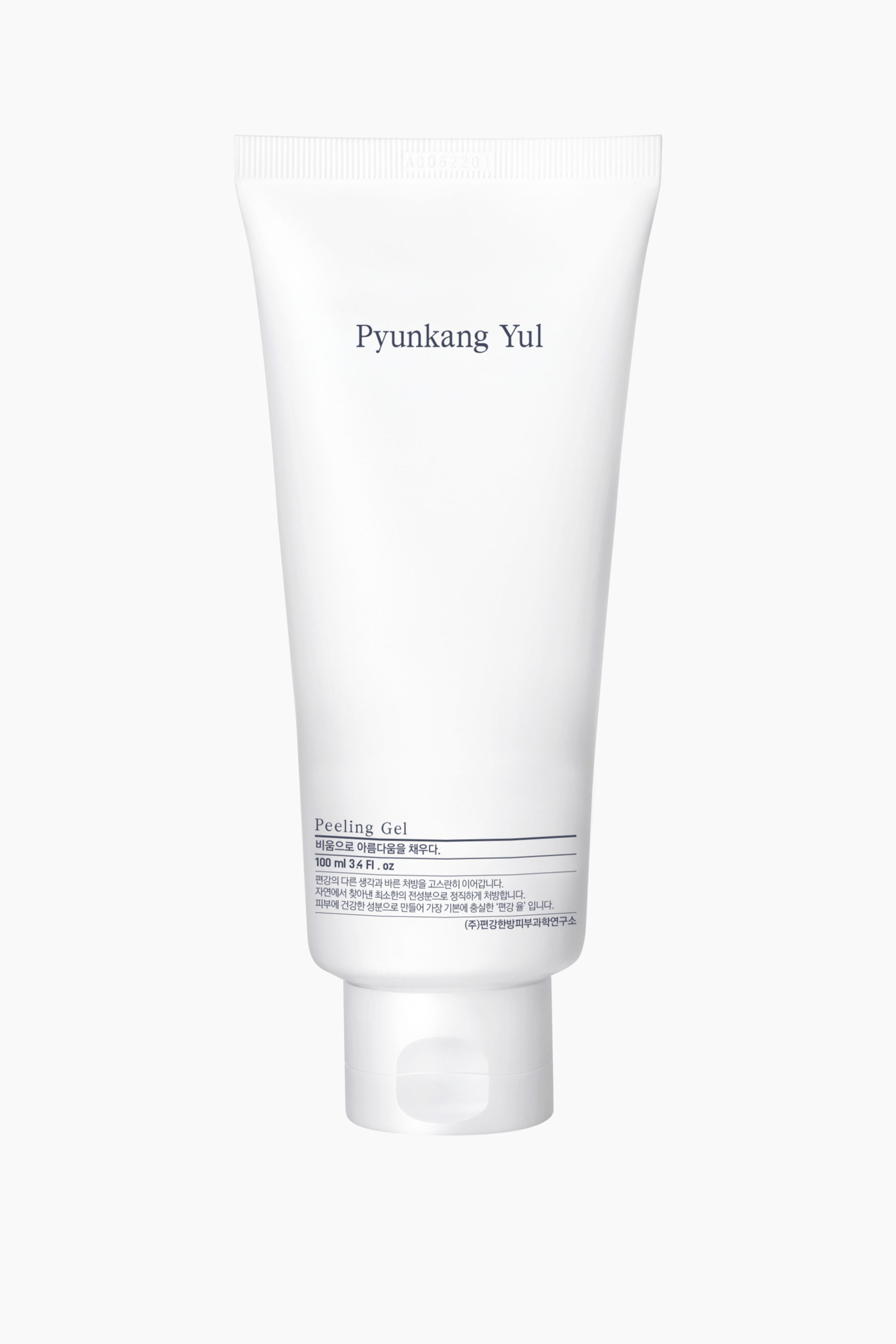 Se større billede: En hvid, blød tube med Pyunkang Yul Peeling Gel står opret. Den viser 'Pyunkang Yul' og 'Peeling Gel' i sort tekst samt '100 ml 3.4 Fl. oz', og er lukket med et hvidt flip-top-låg ved bunden.