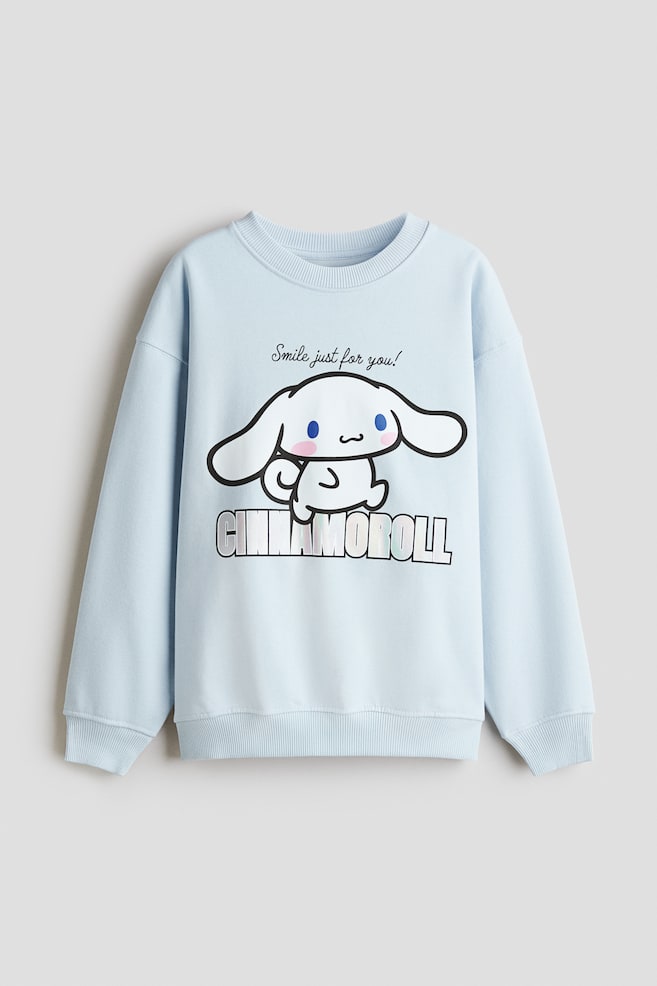 Sudadera estampada con interior cepillado - Azul claro/Cinnamoroll/Violeta oscuro/Snoopy/Crema/Miffy/Rosa/SmileyWorld®/Violeta claro/Kuromi/Gris antracita/CapyFun/Blanco/Las guerreras K-pop - 1