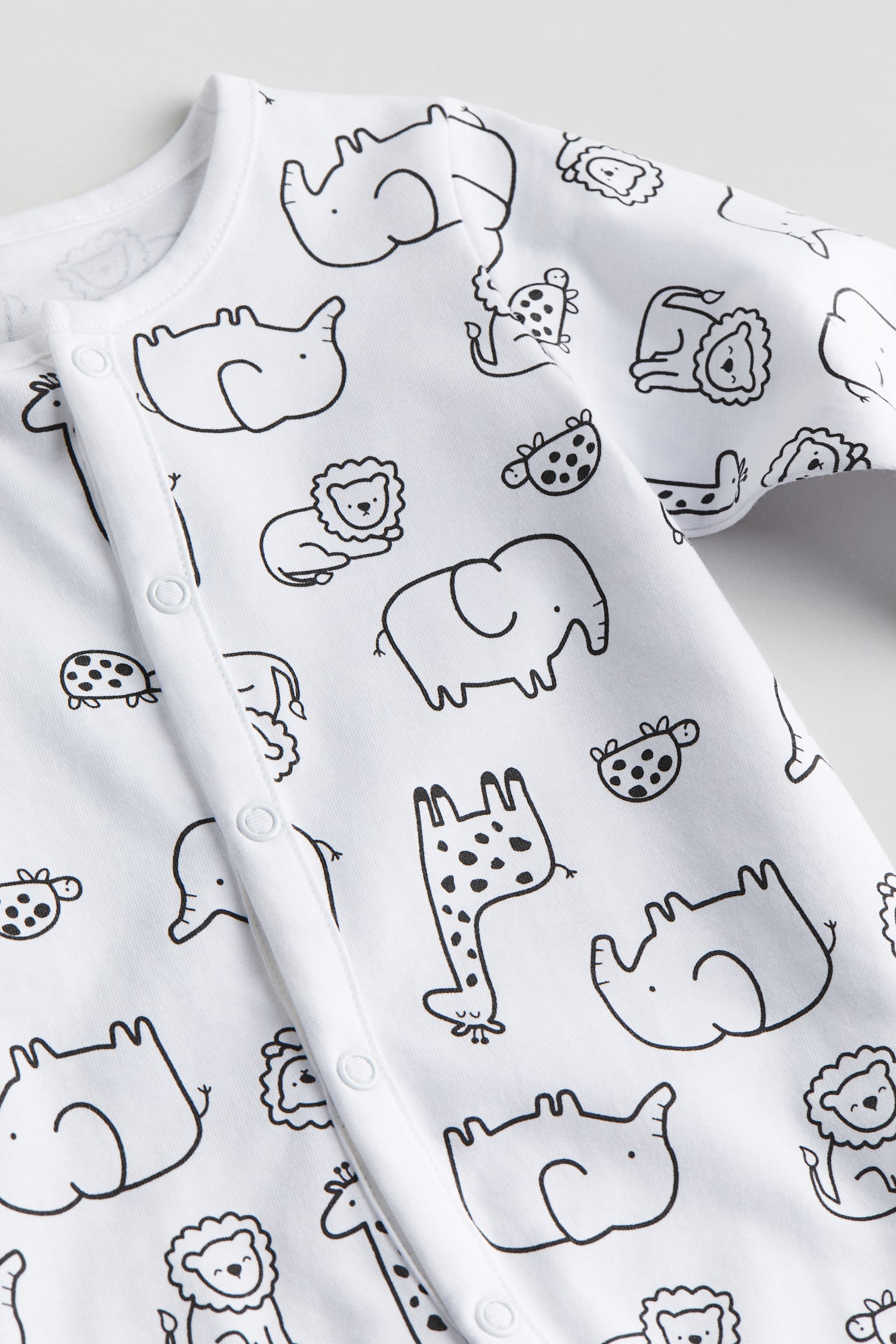 Pattern Sleepsuit - White/Giraffes/Light pink/Butterflies/Cream/Dinosaurs/Light blue/Clouds/Light beige/Cats - 3