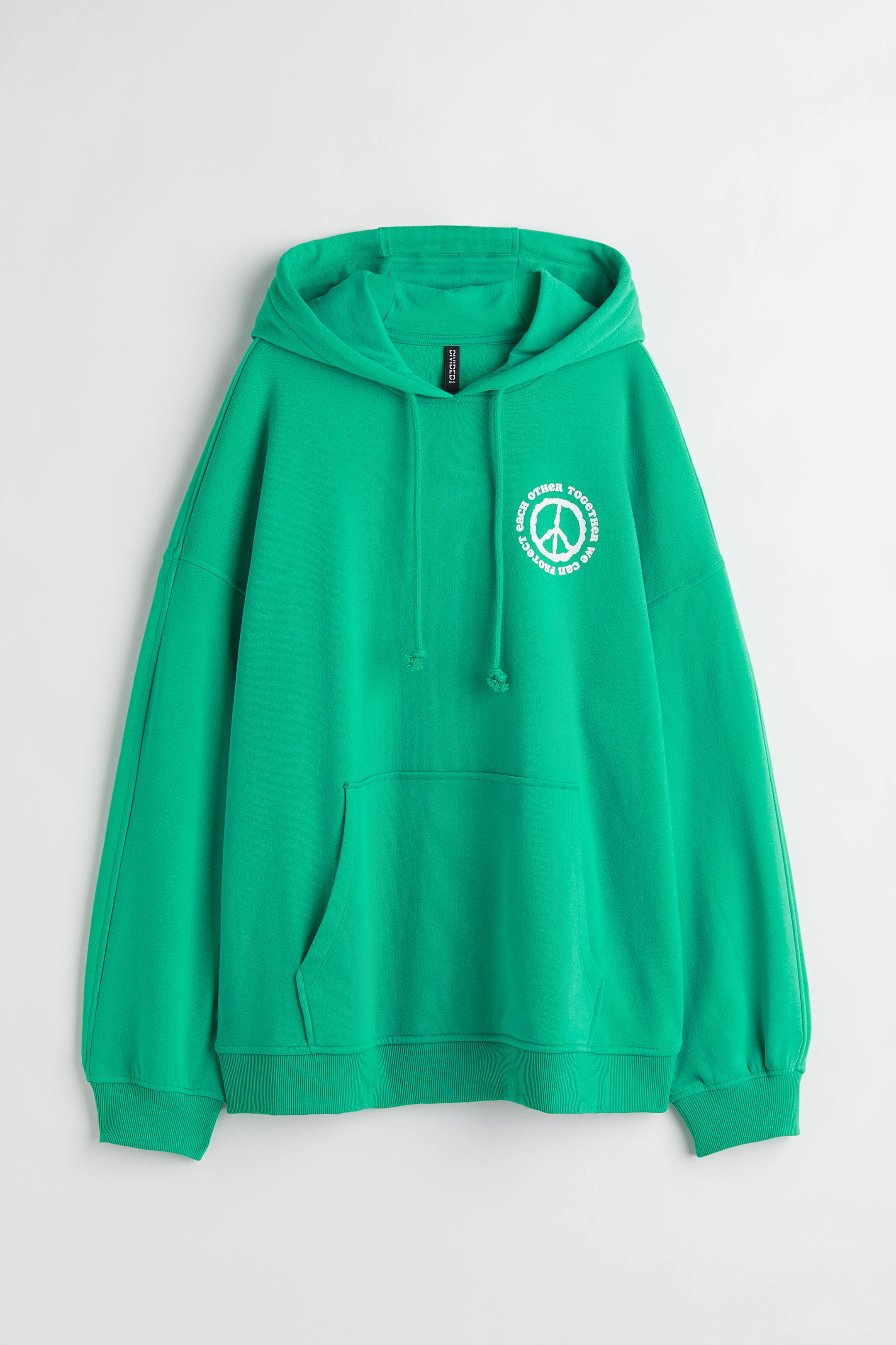 הצגת תמונה גדולה יותר: קפוצ'ון Oversized - ירוק/Love - Ladies | H&M IL 1