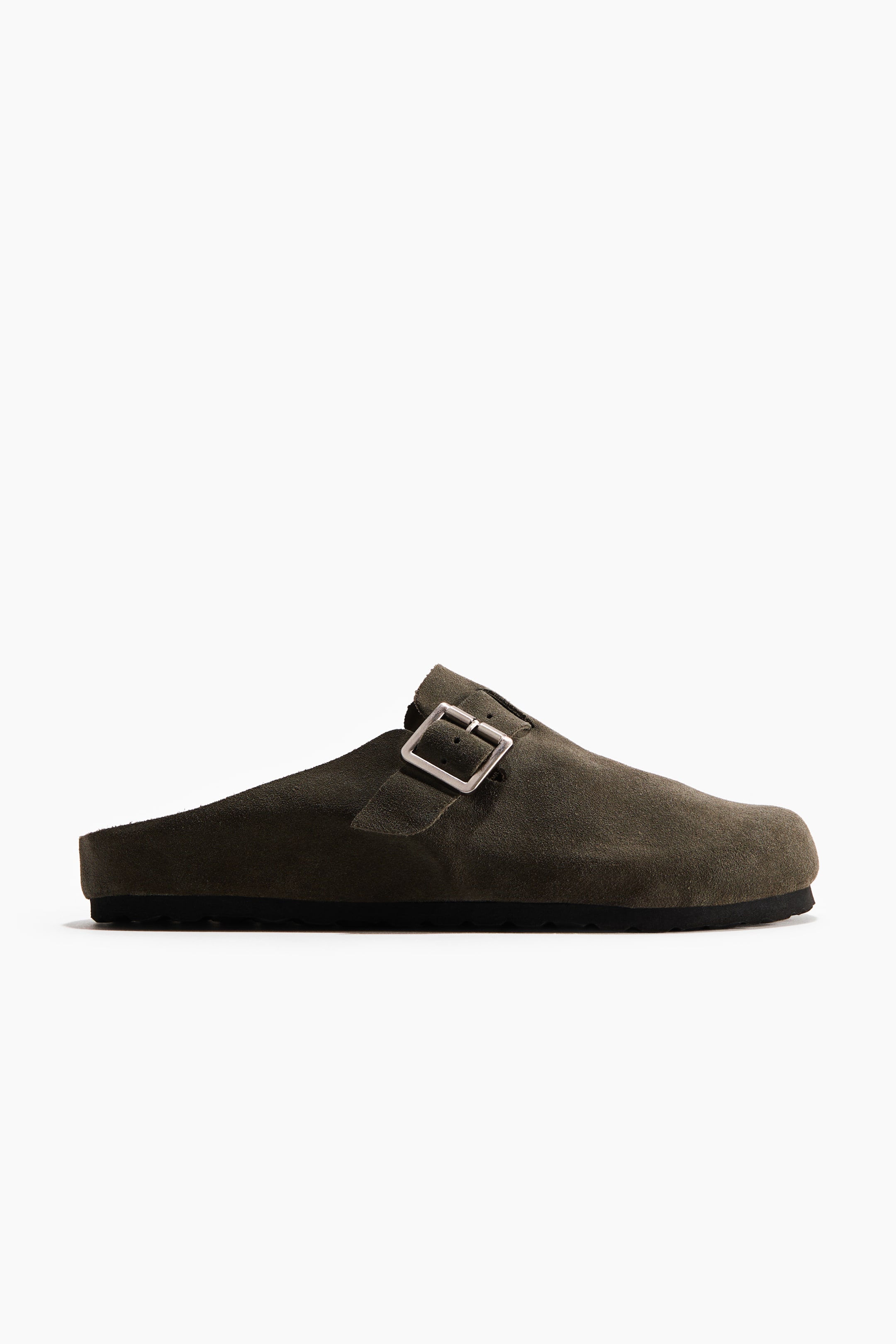 View larger image: A dark olive green leather mule is facing right. It features a wide strap with a silver-toned rectangular metal buckle on top, and a black sole.
