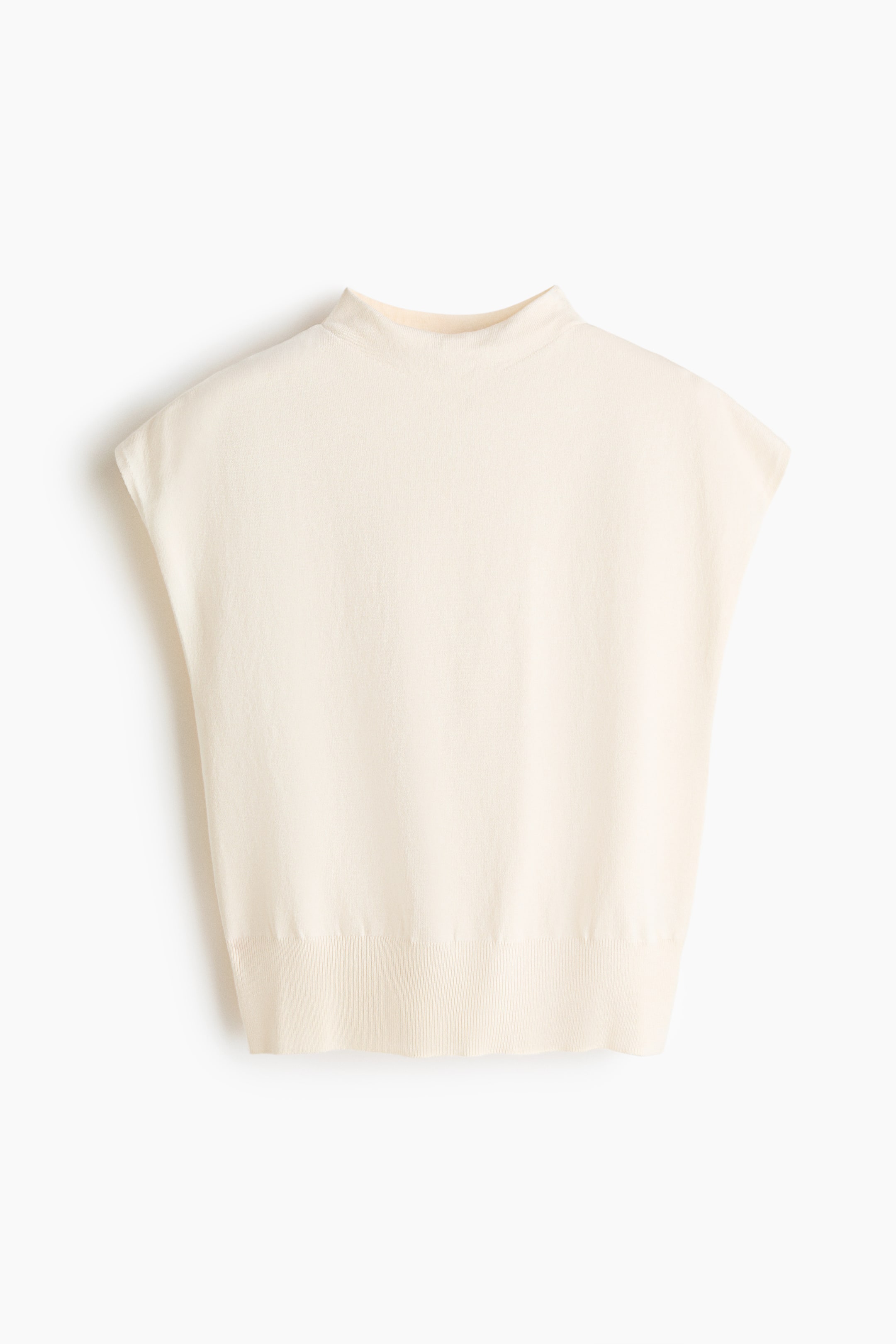 View larger image: A cream-coloured sleeveless top is facing front, featuring a mock neck, cap sleeves, and a ribbed hem. It is showcasing a finely knit texture.