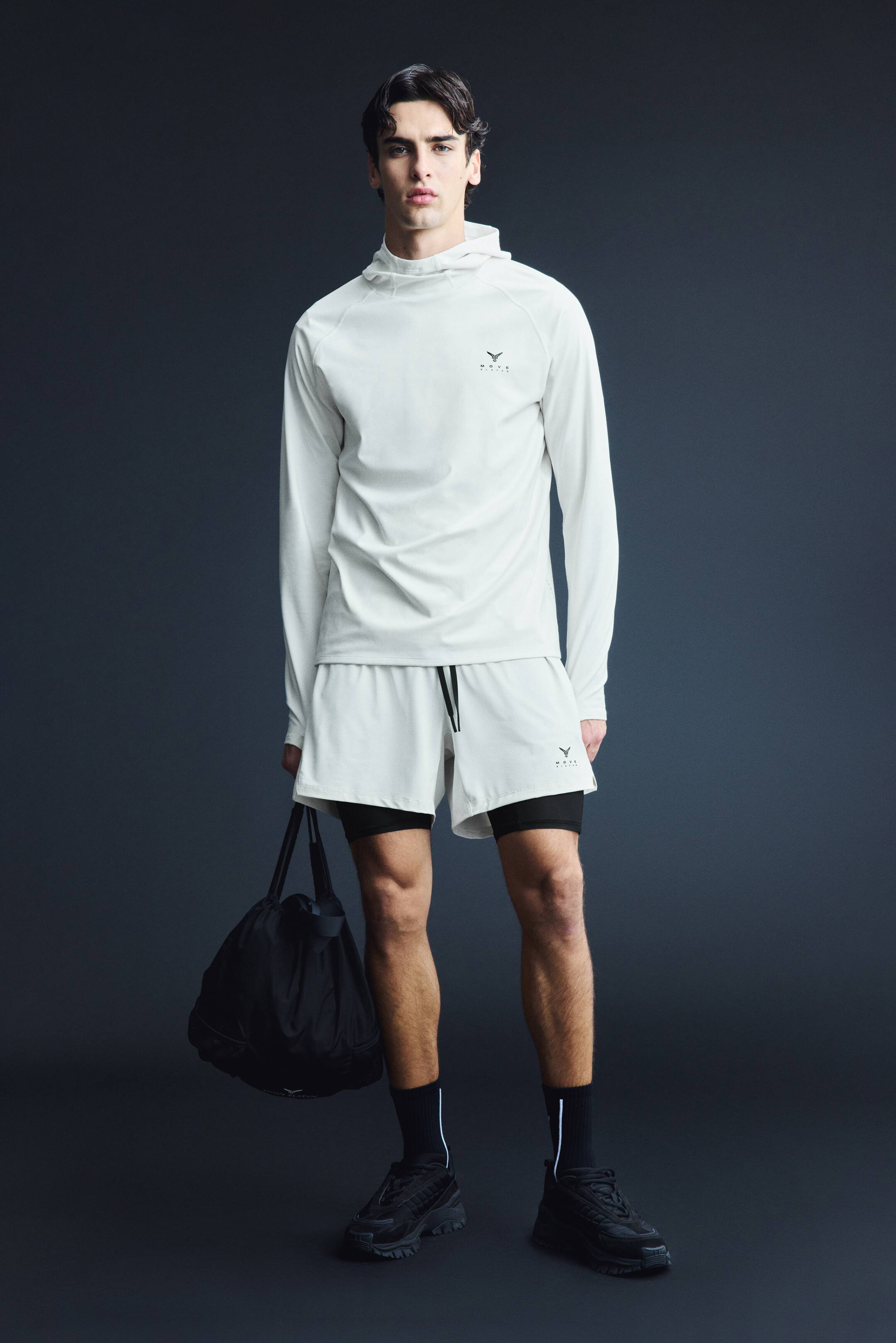 拡大画像を表示: ダブルレイヤースポーツショートパンツ DryMove™ - ホワイト／Move Zlatan - Men | H&M JP 1