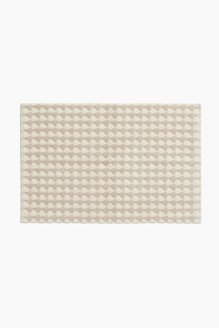 Light taupe/dotted Patterned Cotton Bath Mat at H&M Home | H&M US