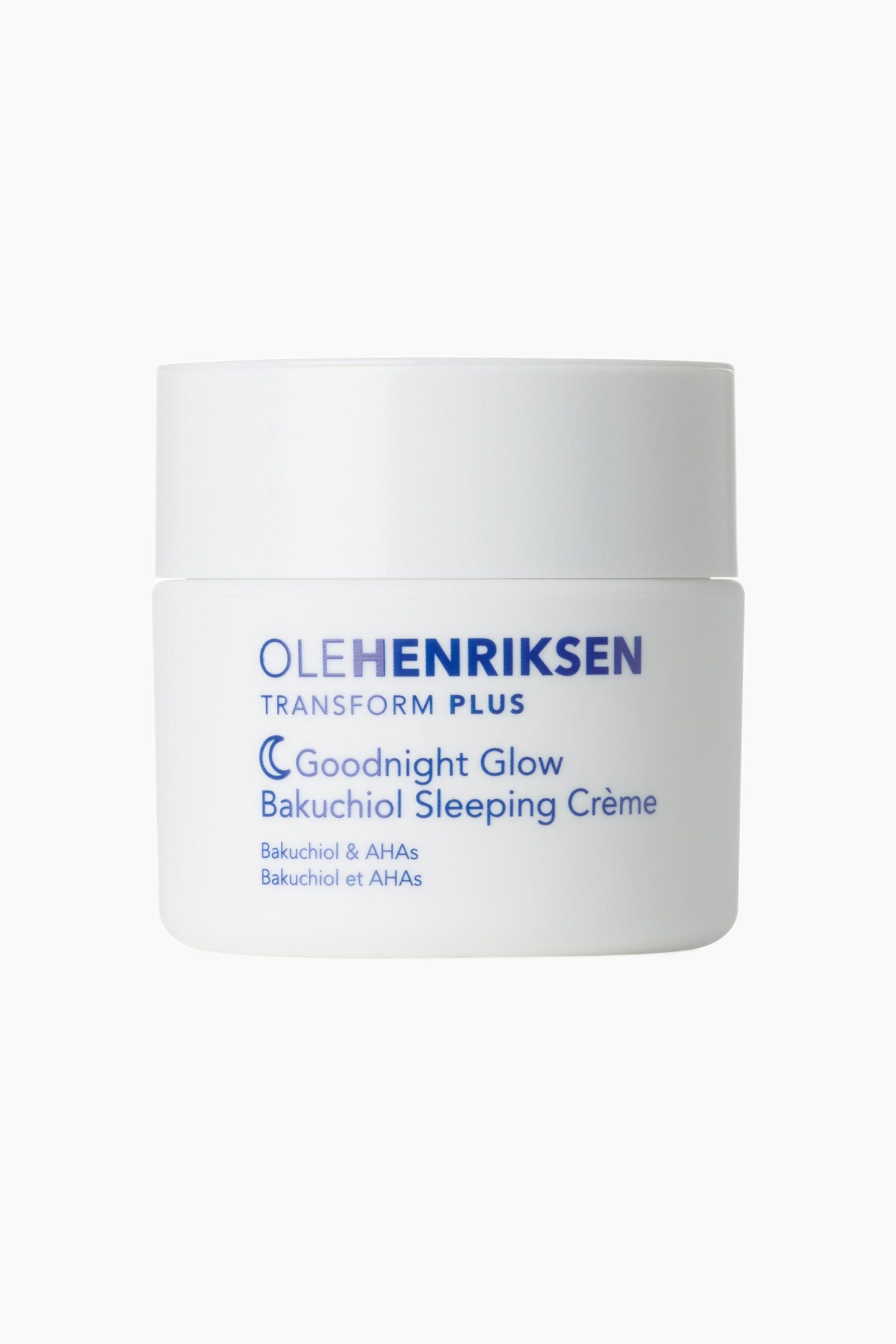 Se større billede: En hvid OLEHENRIKSEN Goodnight Glow Bakuchiol Sleeping Crème-krukke står oprejst og vender fremad. Den har blå tekst på forsiden, herunder brandnavnet OLEHENRIKSEN, produktlinjen TRANSFORM PLUS, produktnavnet Goodnight Glow Bakuchiol Sleeping Crème samt ingrediensoplysningerne Bakuchiol & AHAs på både engelsk og fransk.