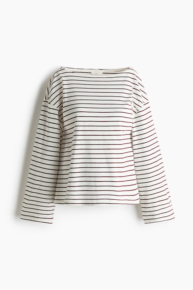 A long-sleeved top is presented FRONT, featuring off-white fabric with narrow, dark reddish-brown horizontal stripes. It is designed with a boat neckline, dropped shoulders, and wide, long sleeves. - 1