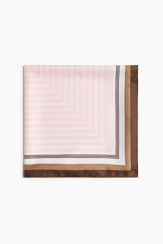A large, square scarf in a soft weave showcases a nested square pattern. The centre features thin pink stripes on a white background, bordered by alternating white bands and triple brown stripes. The outermost edge presents solid light brown and dark brown bands. - 1