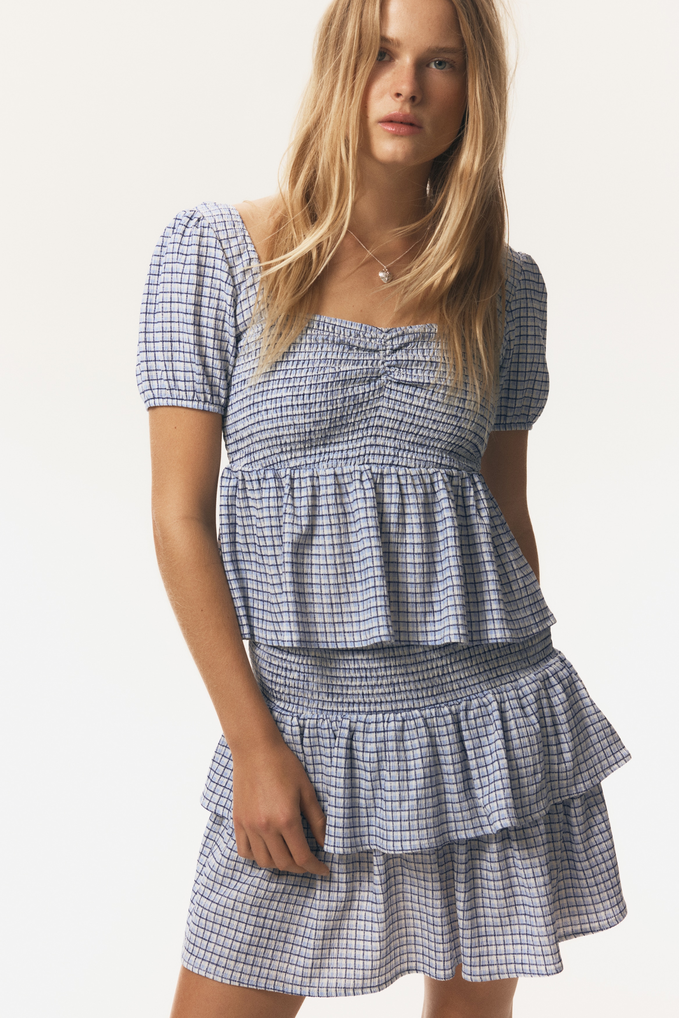 Smocked peplum blouse