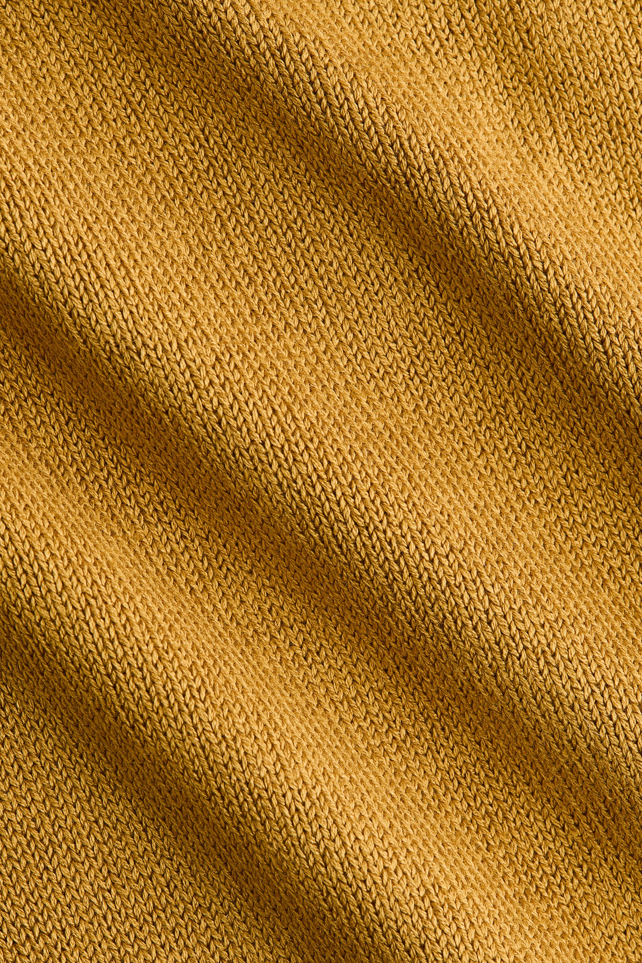 Haut asymétrique en fin tricot