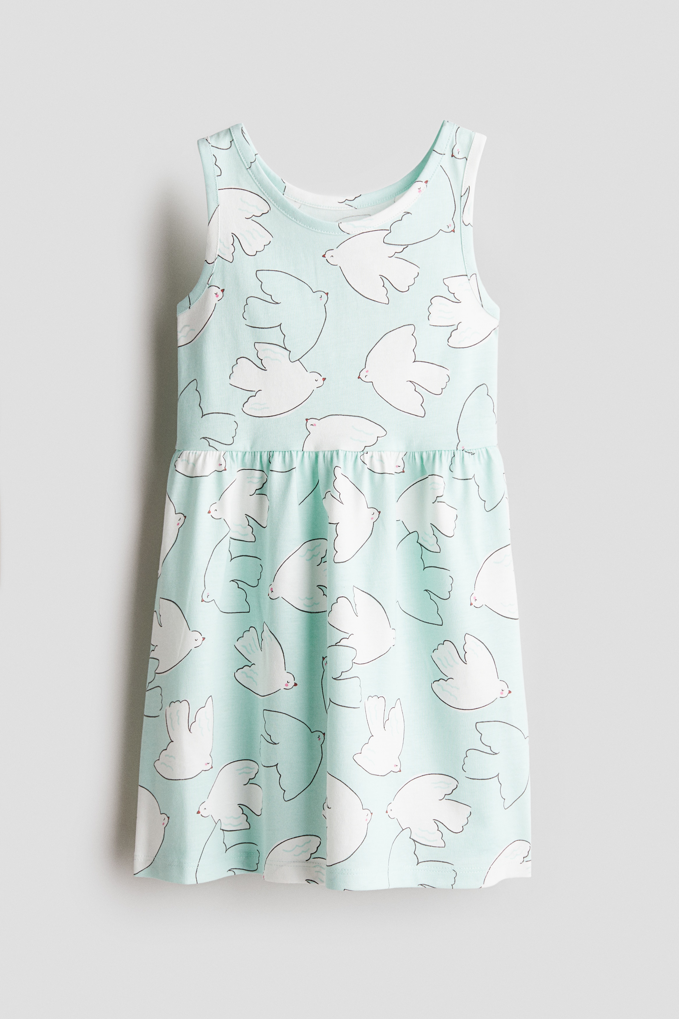 Mønstret bomullskjole - Lys turkis/Fugler/Lys gul/Hello Sun/Gul/Sitroner/Lys rosa/Svaner/Lys rosa/Sløyfer/Hvit/Hjerter/Cream/Livet i havet/Ferskenrosa/Sommerfugler/Hvit/Sebratrykk/Lys turkis/Iskremer