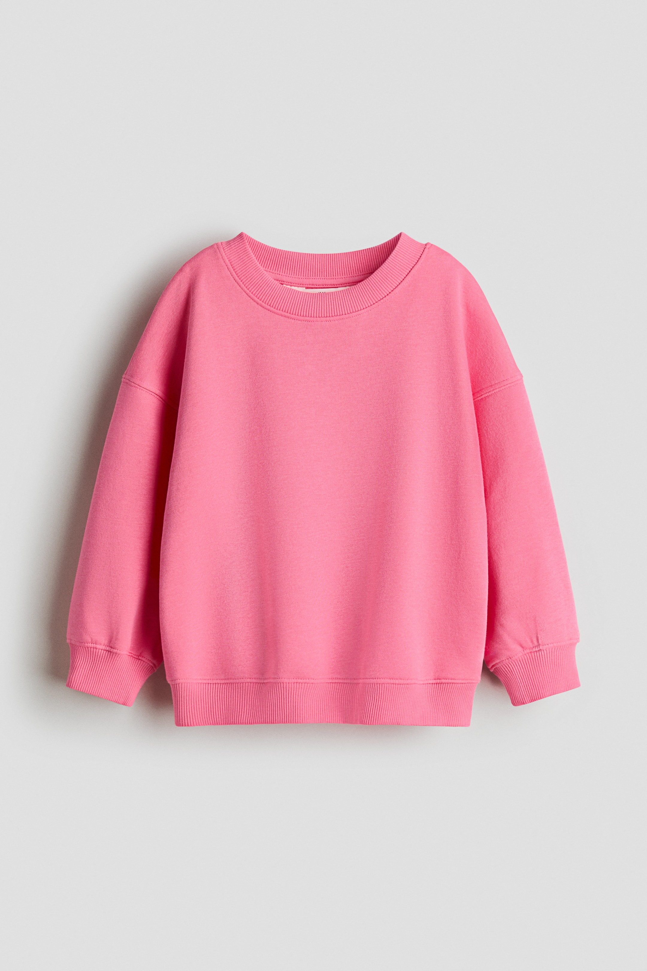 View larger image: Oversized brushed-inside sweatshirt - Dark pink - Kids | H&M IN 1