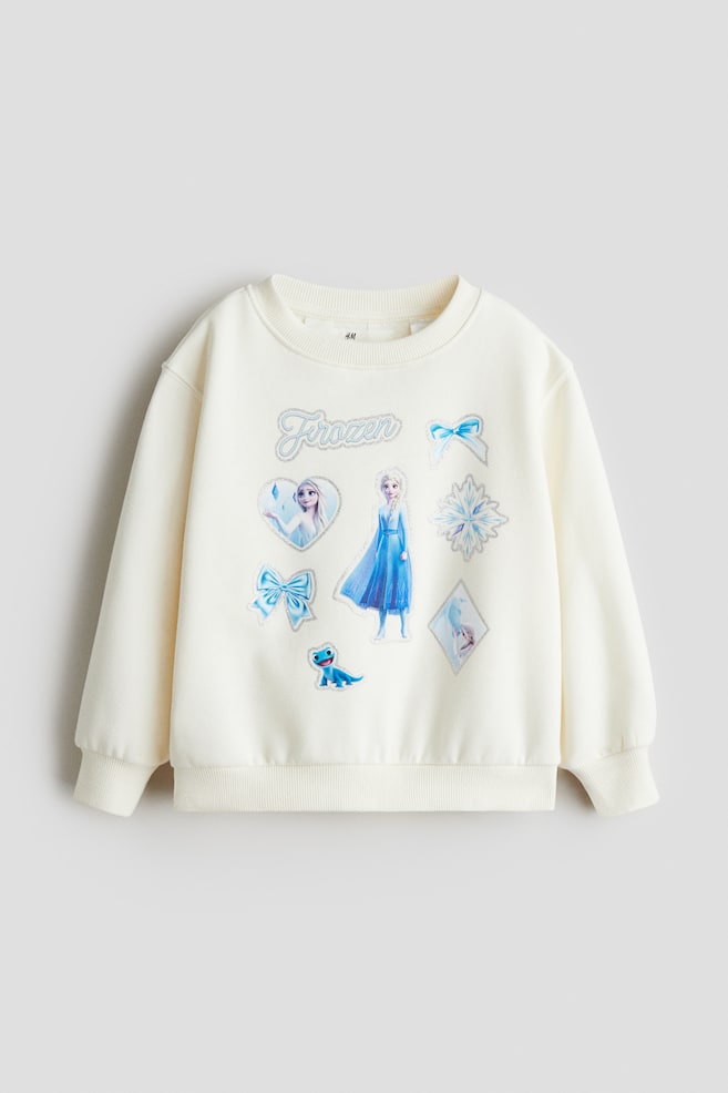 Bluza z motywem - Biały/Kraina lodu/Jasnoniebieski/Kraina lodu/Kremowy/Lilo i Stitch/Biały/Myszka Minnie/Biały/Myszka Minnie/Kremowy/SmileyWorld®/Czarny/Lilo i Stitch/Jasnoróżowy/CapyFun - 1