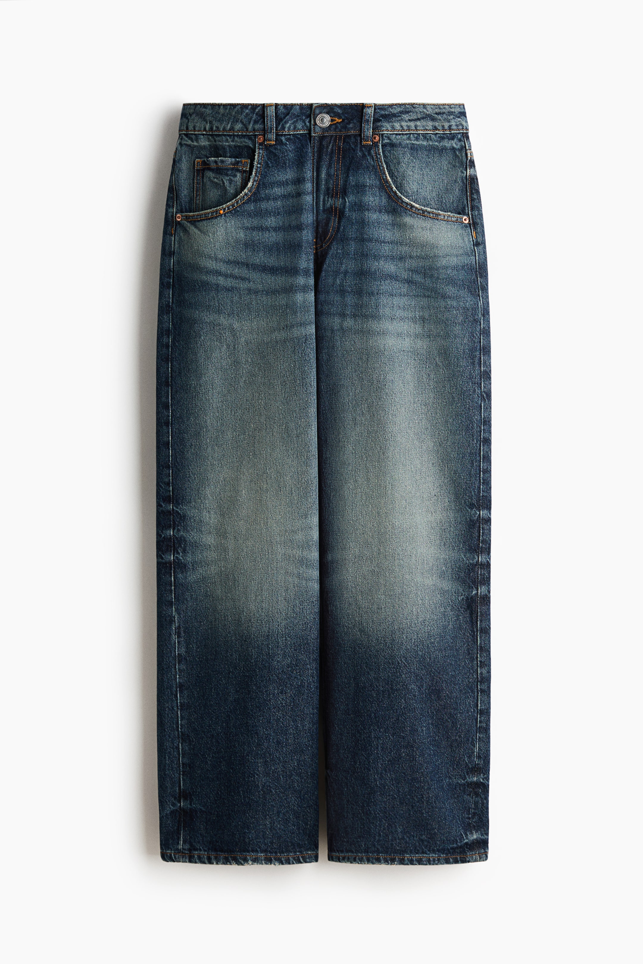 View larger image: Blue denim jeans are laid flat in a front view, showcasing a faded wash with lighter areas on the thighs and knees. They feature a single metal button closure, belt loops on the waistband, two front curved pockets with small metal rivets, and straight legs with a standard hem.