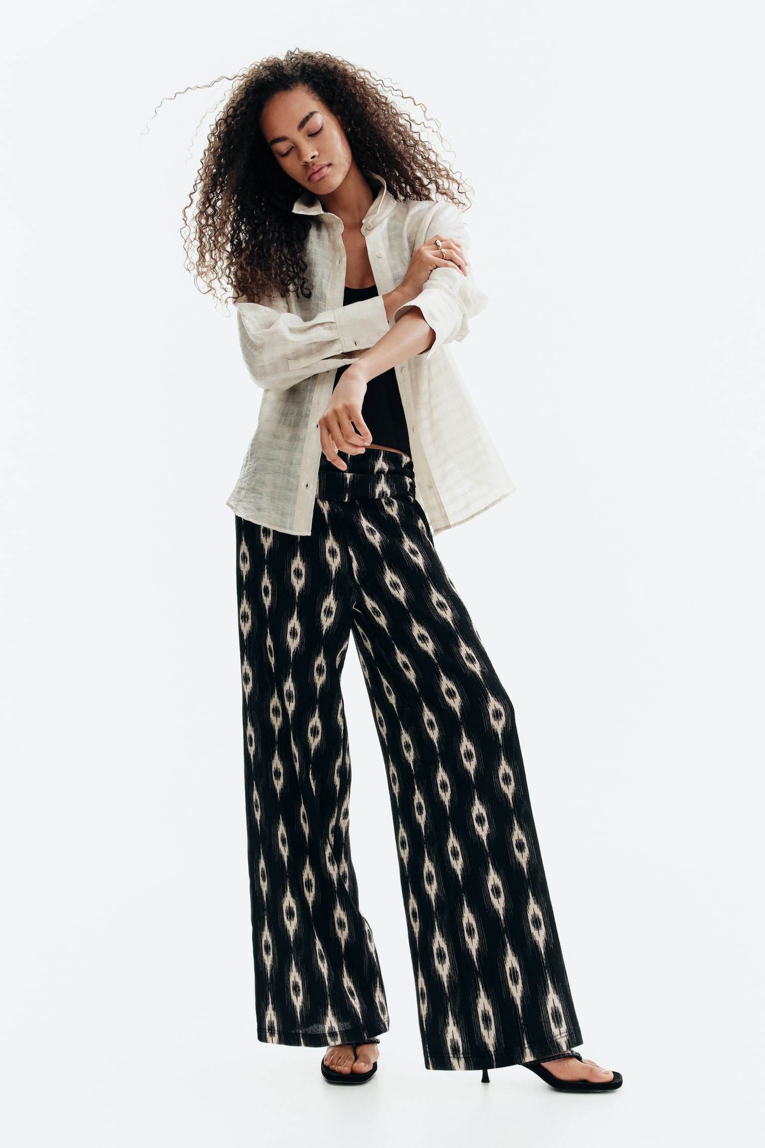 Wide gathered-waist trousers - 1