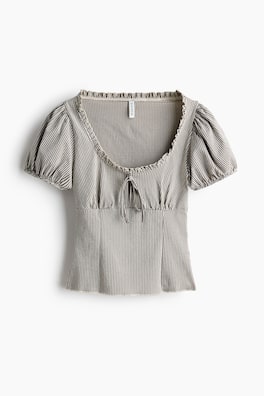 Blus med puffärm och knytdetalj