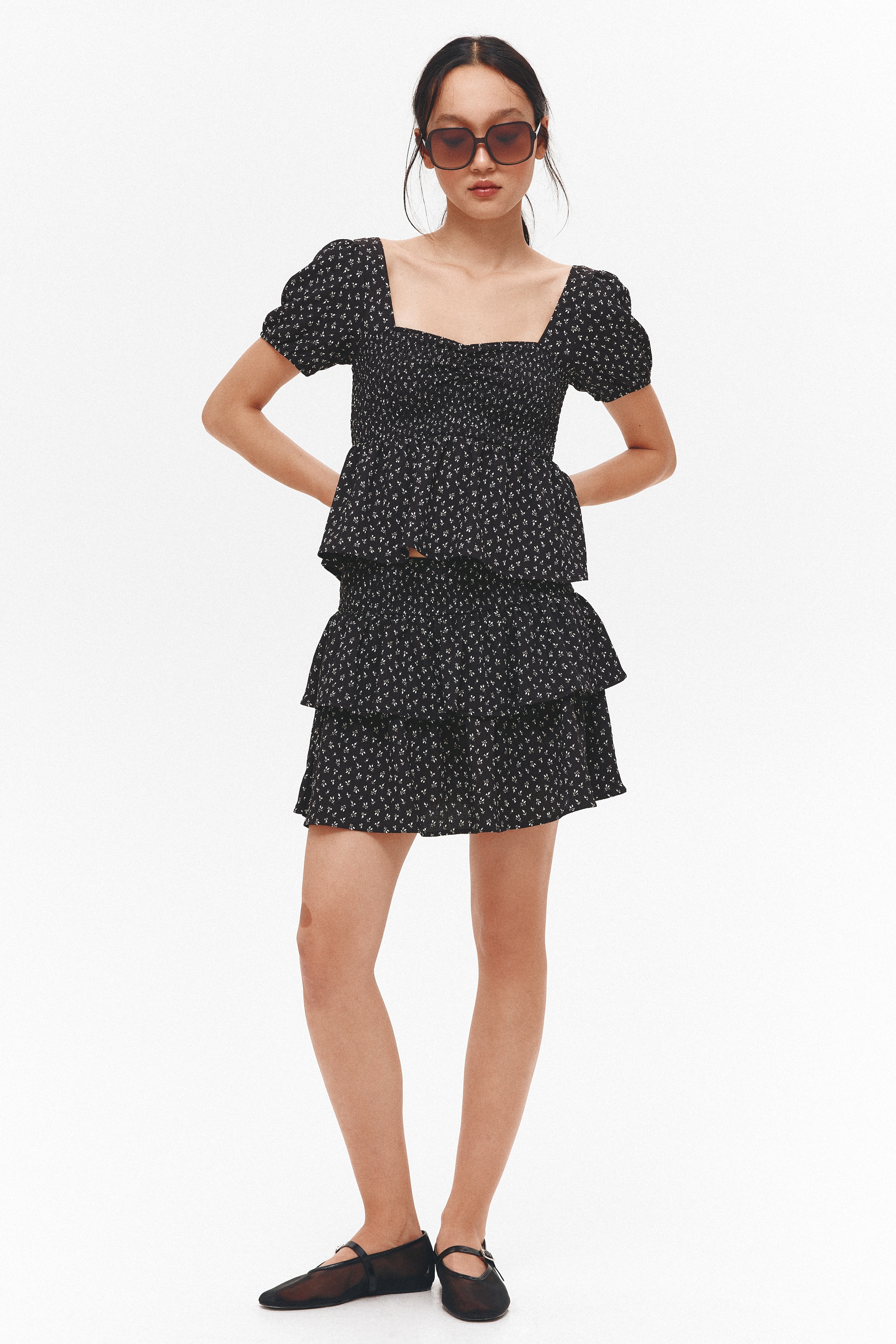 Smocked peplum blouse