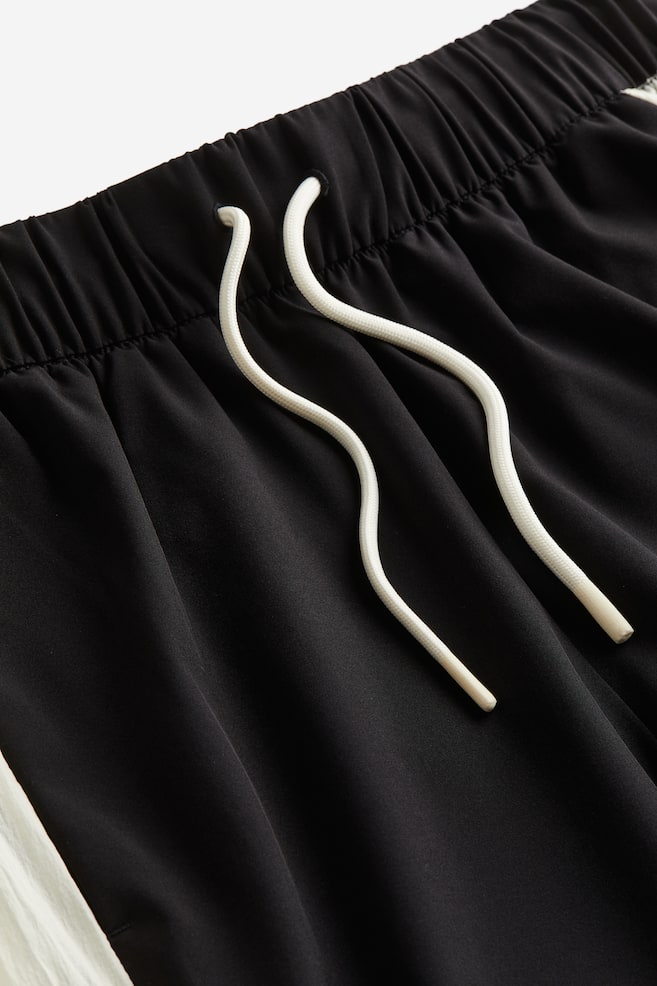Pantalon de survêtement déperlant - Noir/color block - 6