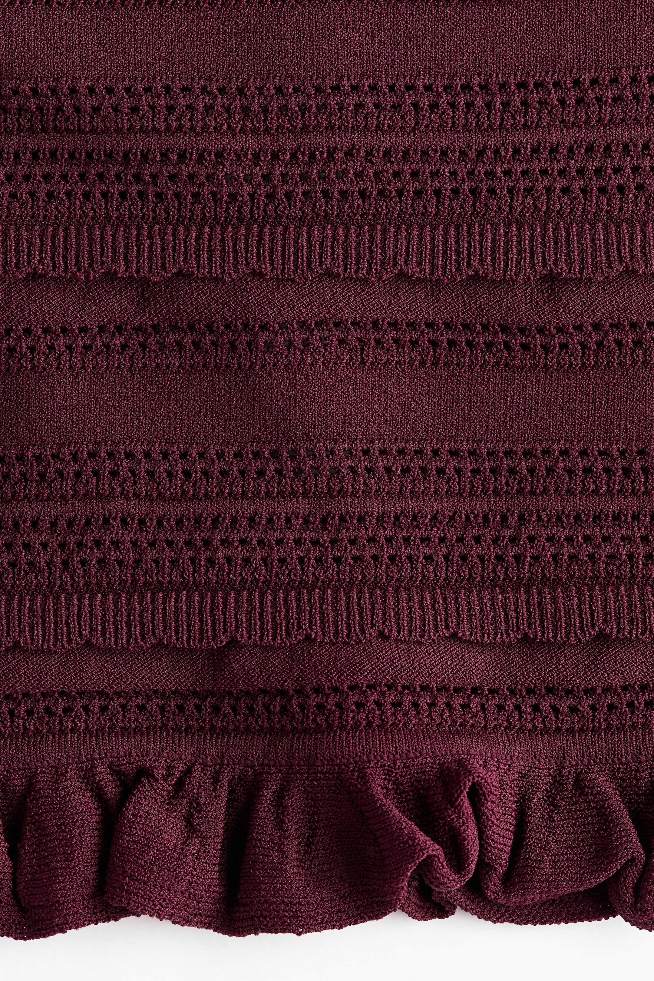 Haut bandeau en tricot pointelle