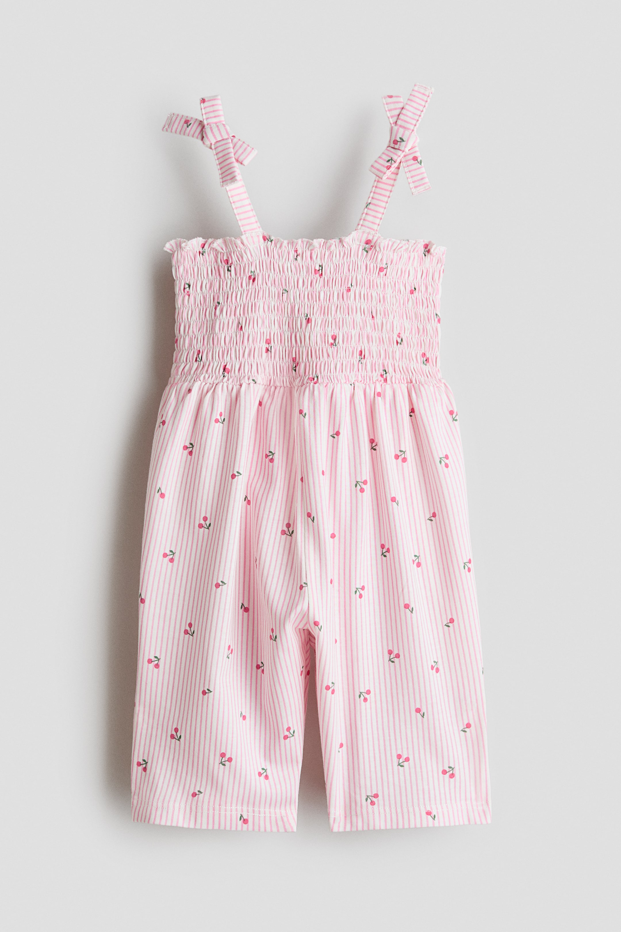 View larger image: Printed cotton rompersuit - Light pink/Cherries - Kids | H&M SG 1