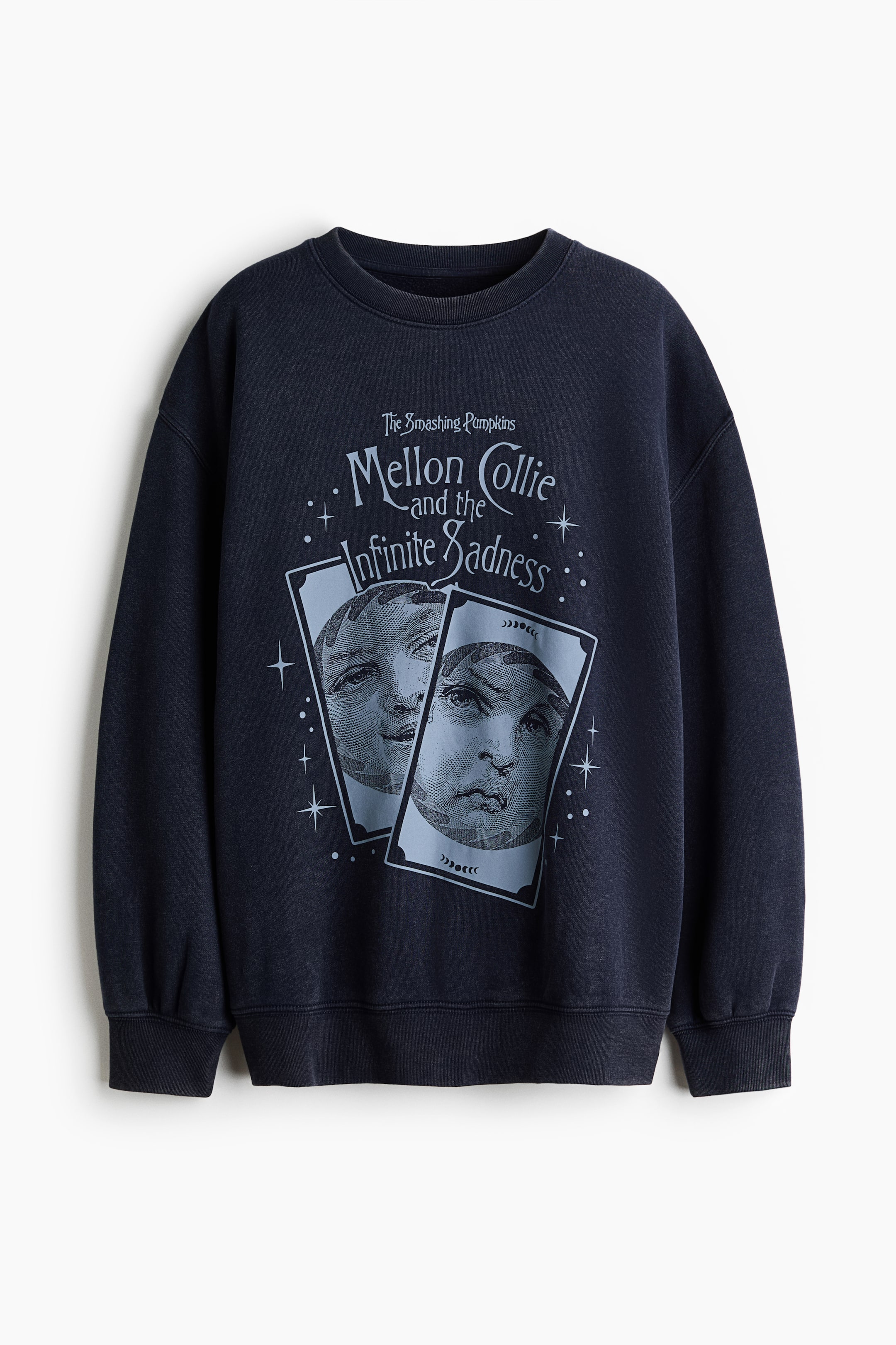 View larger image: A front-facing, oversized dark navy blue sweatshirt featuring a light blue graphic print of The Smashing Pumpkins’ Mellon Collie and the Infinite Sadness artwork on the chest. The sweatshirt has a ribbed crew neck, dropped shoulders, and long sleeves with ribbed cuffs and a ribbed hem.