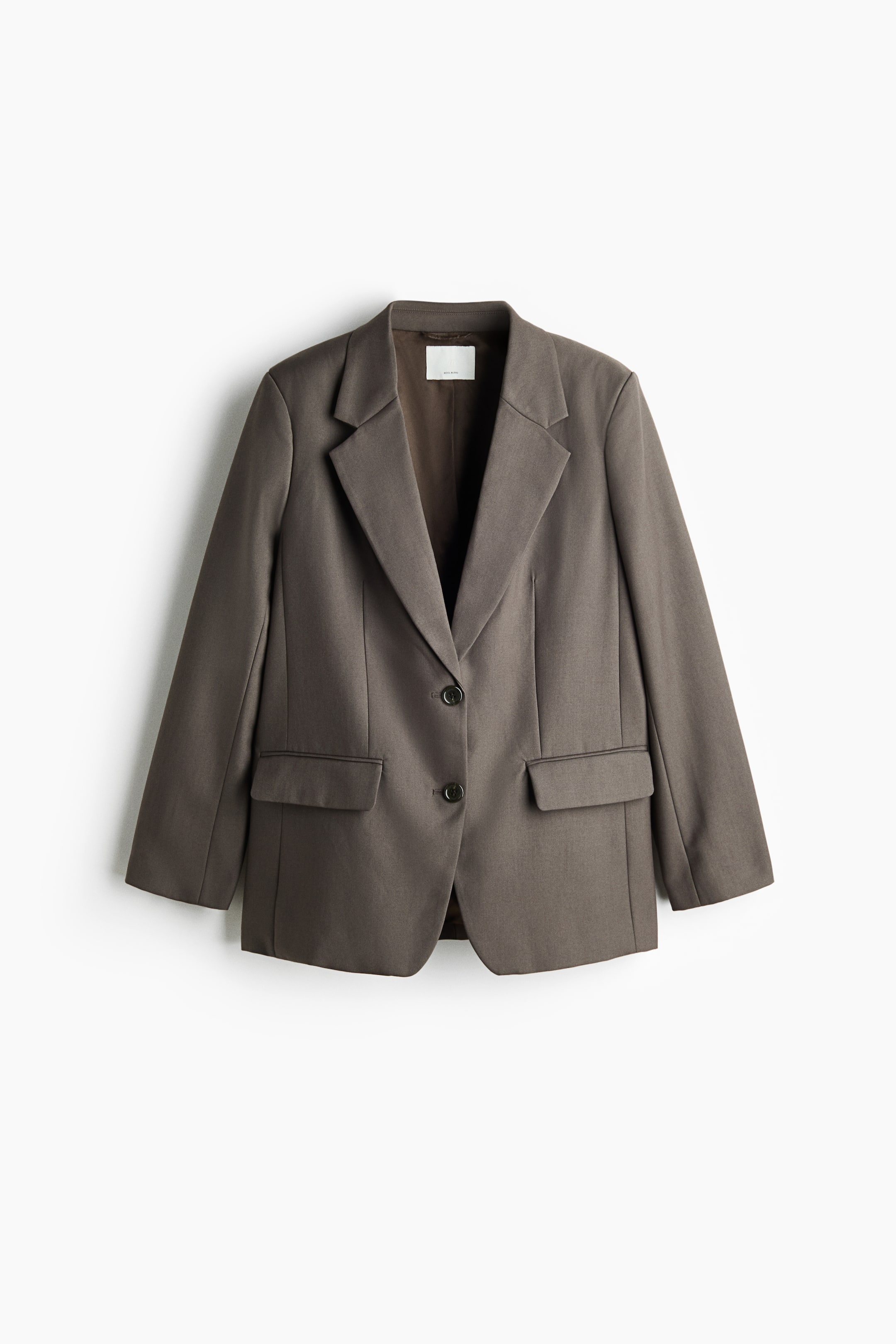 View larger image: A single-breasted wool-blend blazer in taupe-brown is displayed front-facing, featuring wide notch lapels and a two-button closure. The blazer has structured shoulders, vertical waist darts, and two lower front flap pockets.