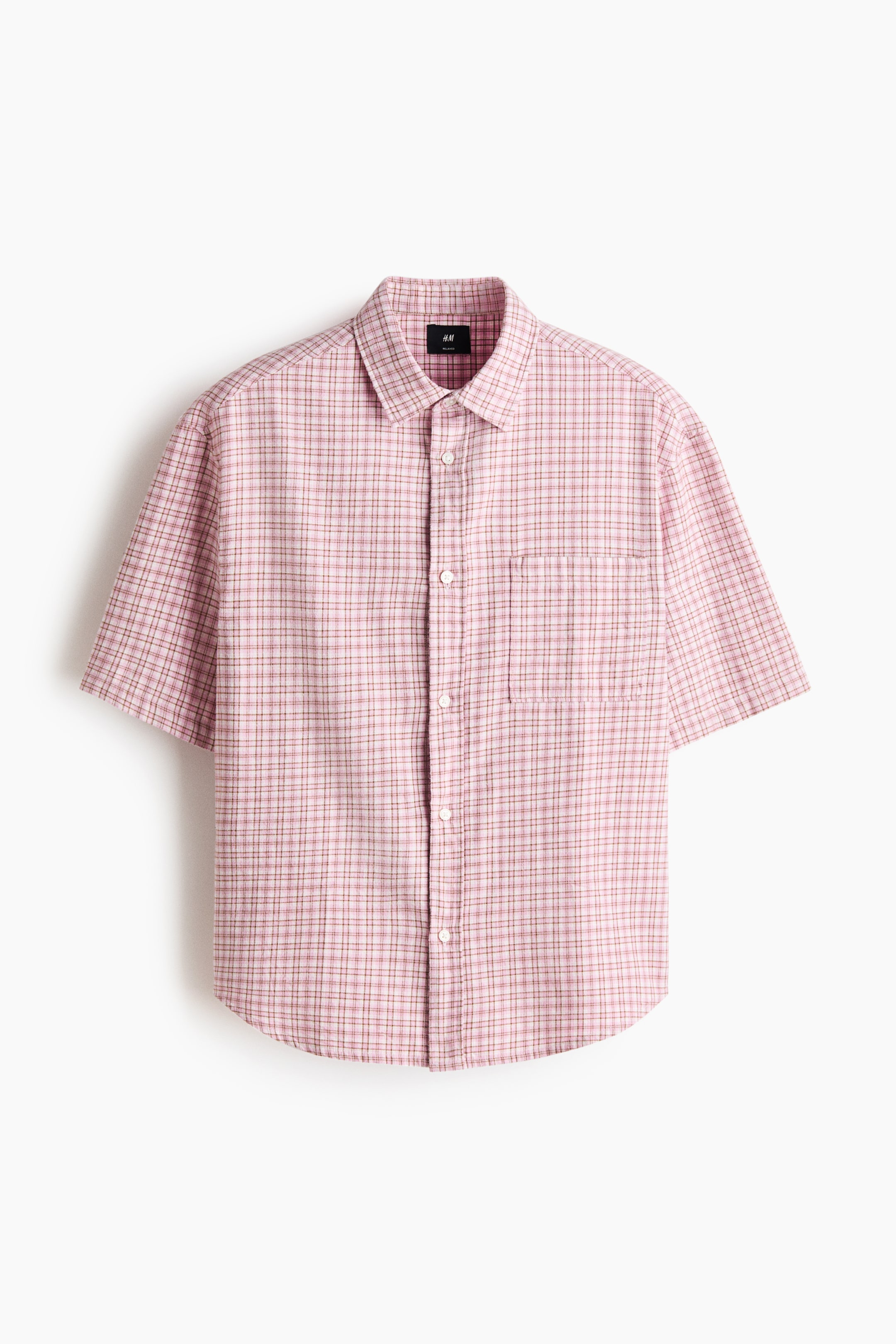 View larger image: The FRONT of a cotton flannel shirt showcases a pink, red, and white checkered pattern, a turn-down collar, a classic button-up front, short sleeves, and a patch chest pocket. It offers a relaxed fit.