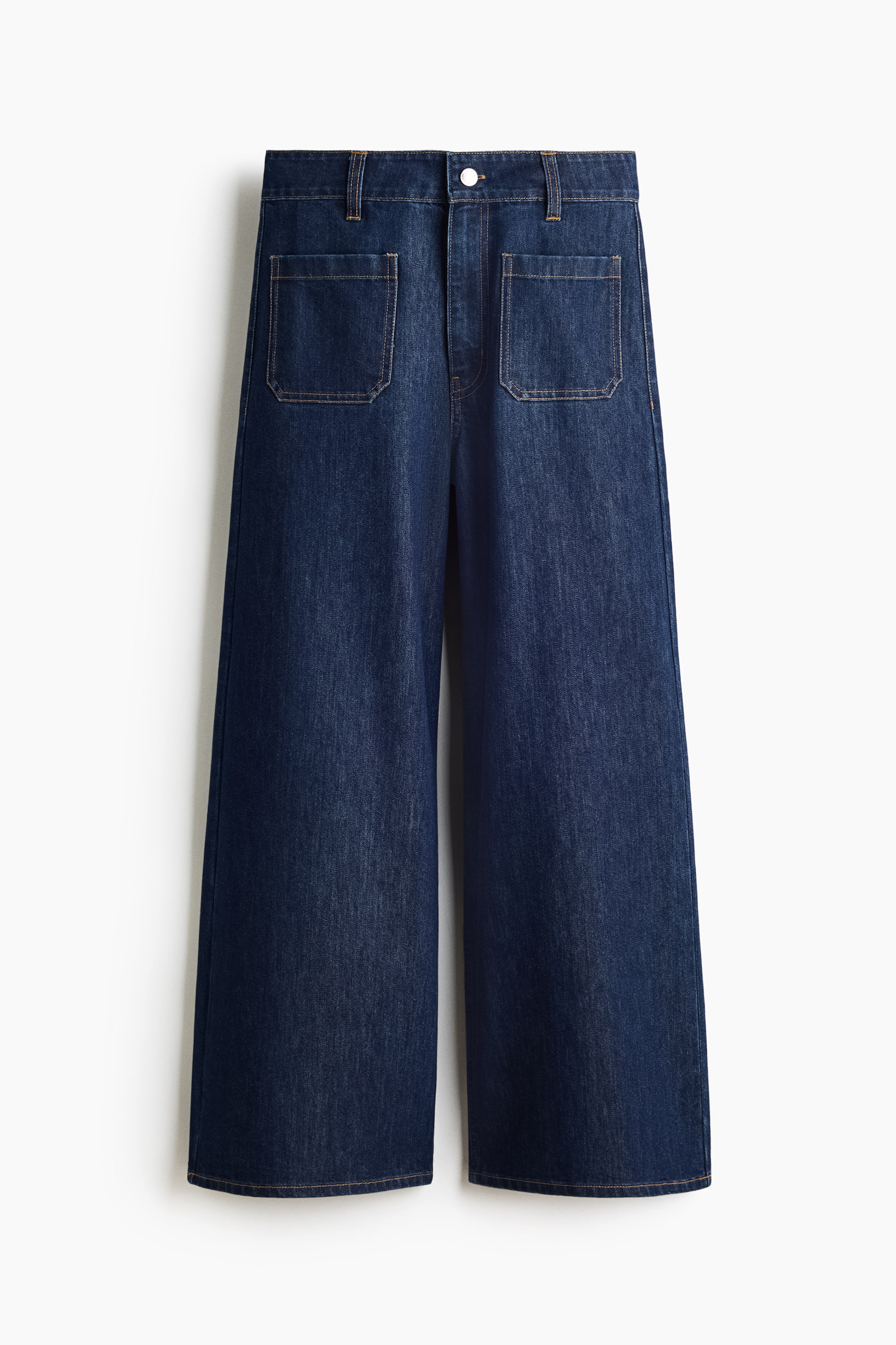 View larger image: Dark blue denim wide-leg jeans featuring two large, rectangular front patch pockets and visible contrast topstitching.