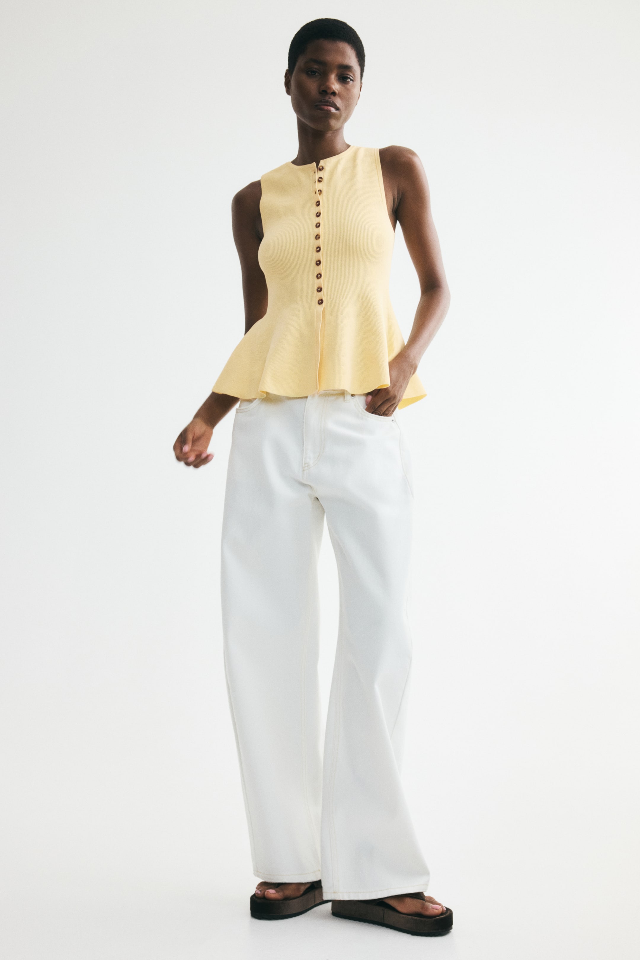 Rib-Knit Peplum Sleeveless Top