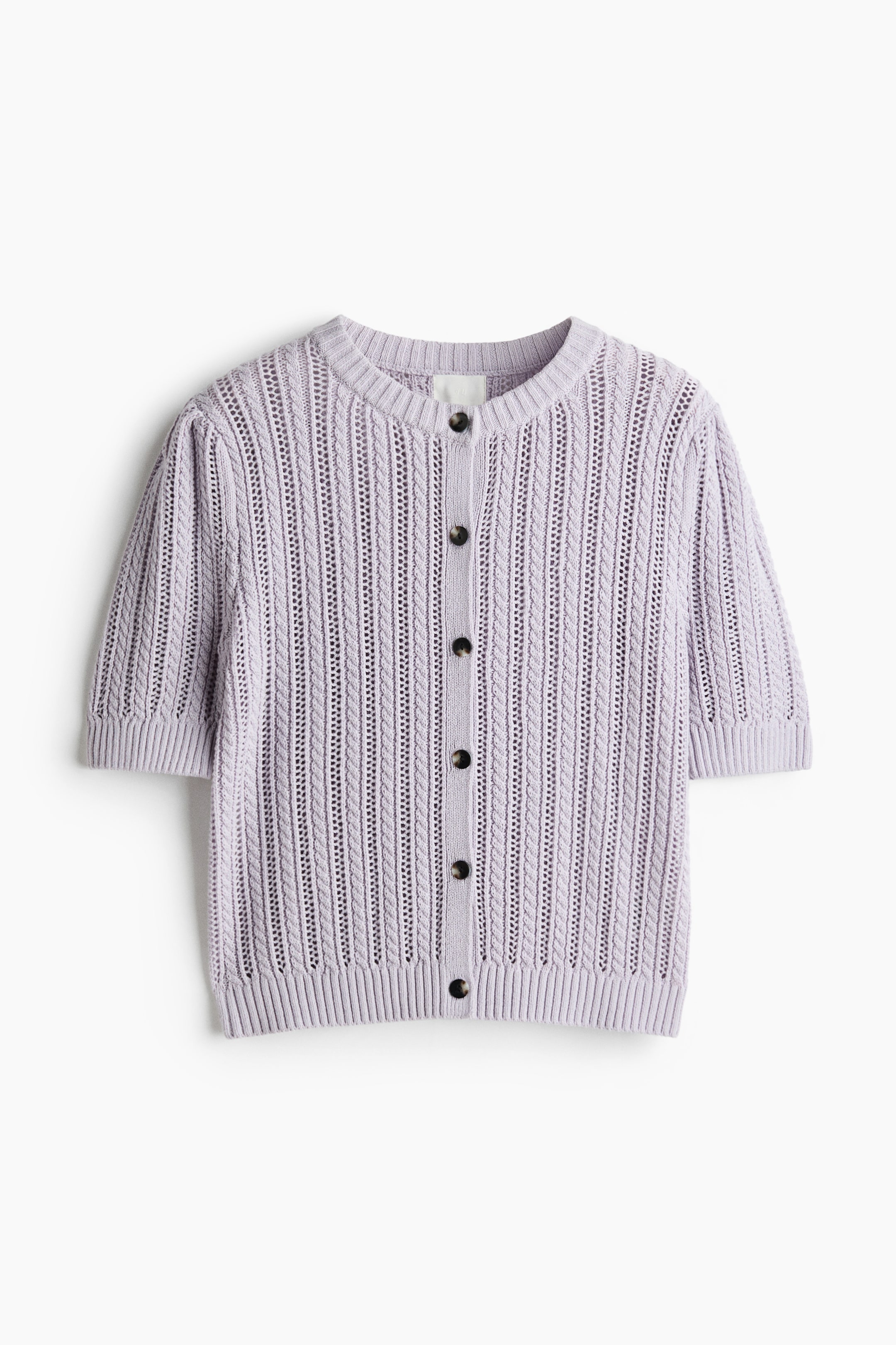 View larger image: Presenting a lavender cardigan with a front view. It showcases an open knit design, alternating between vertical cable knit and lace knit patterns. The cardigan features a round neck and short puff sleeves with ribbed cuffs. It also has a ribbed hem and fastens with five dark brown buttons down the front.