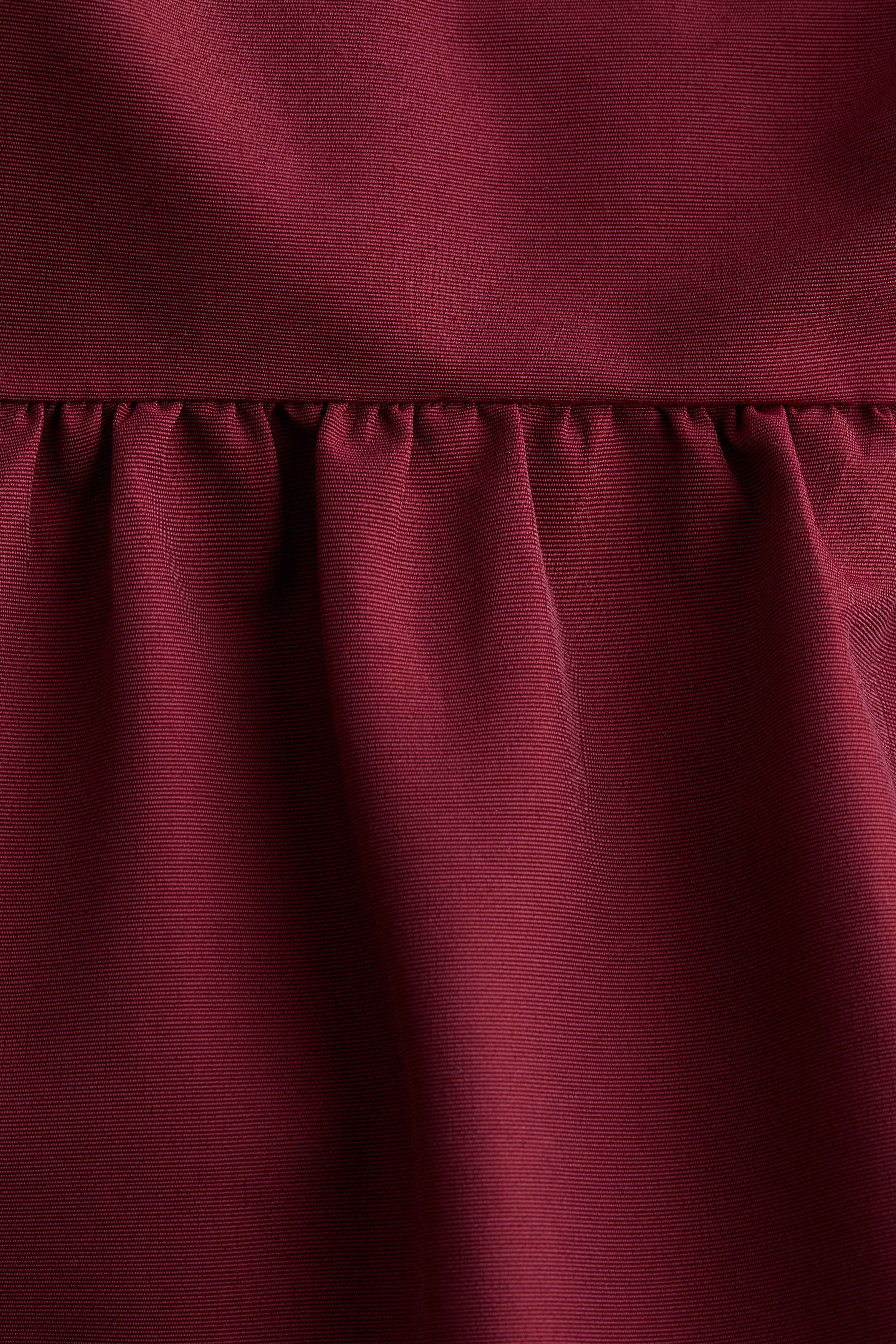 Tie-detail peplum top